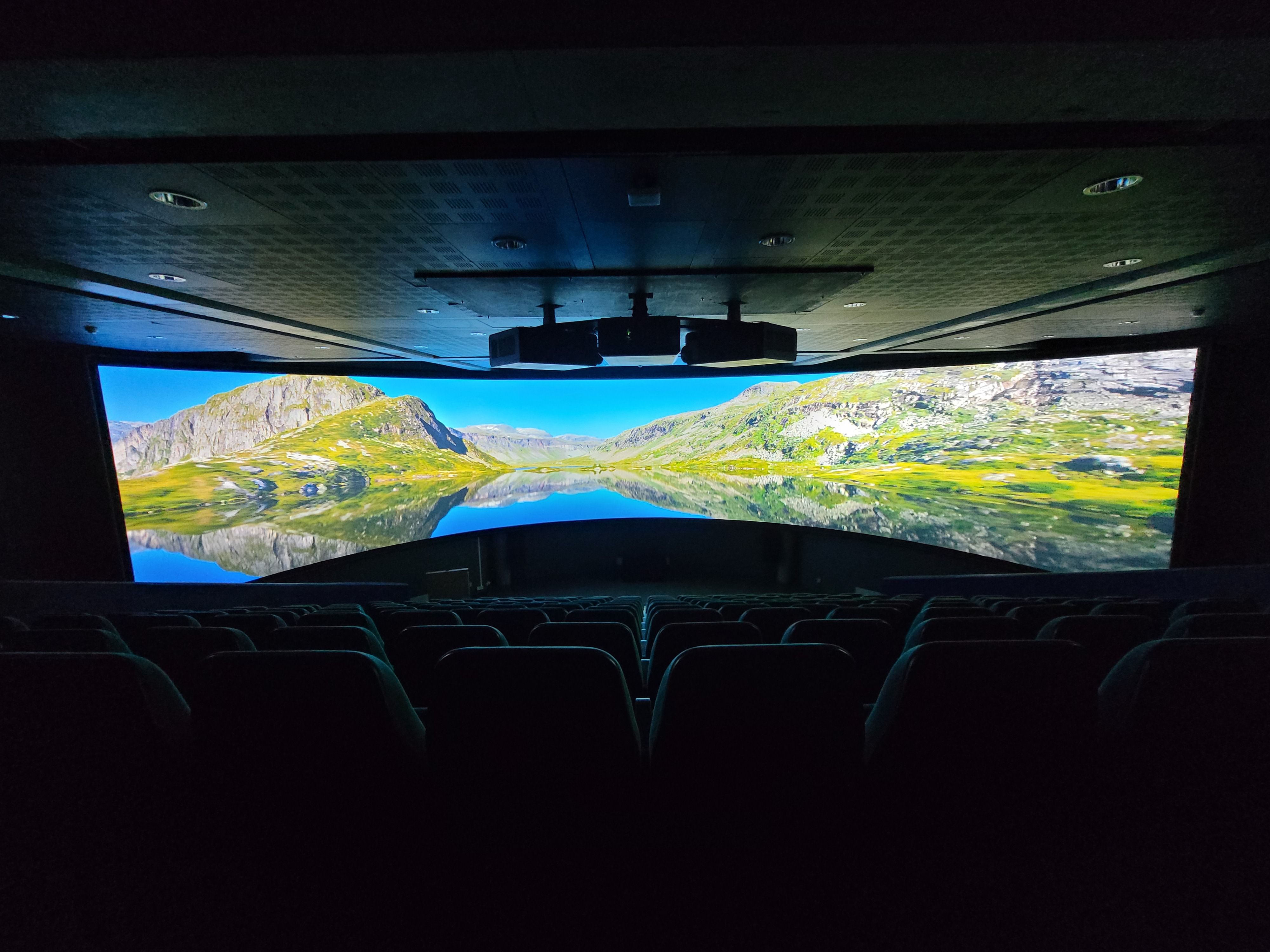 A photo of the panorama movie screen inside the cinema.