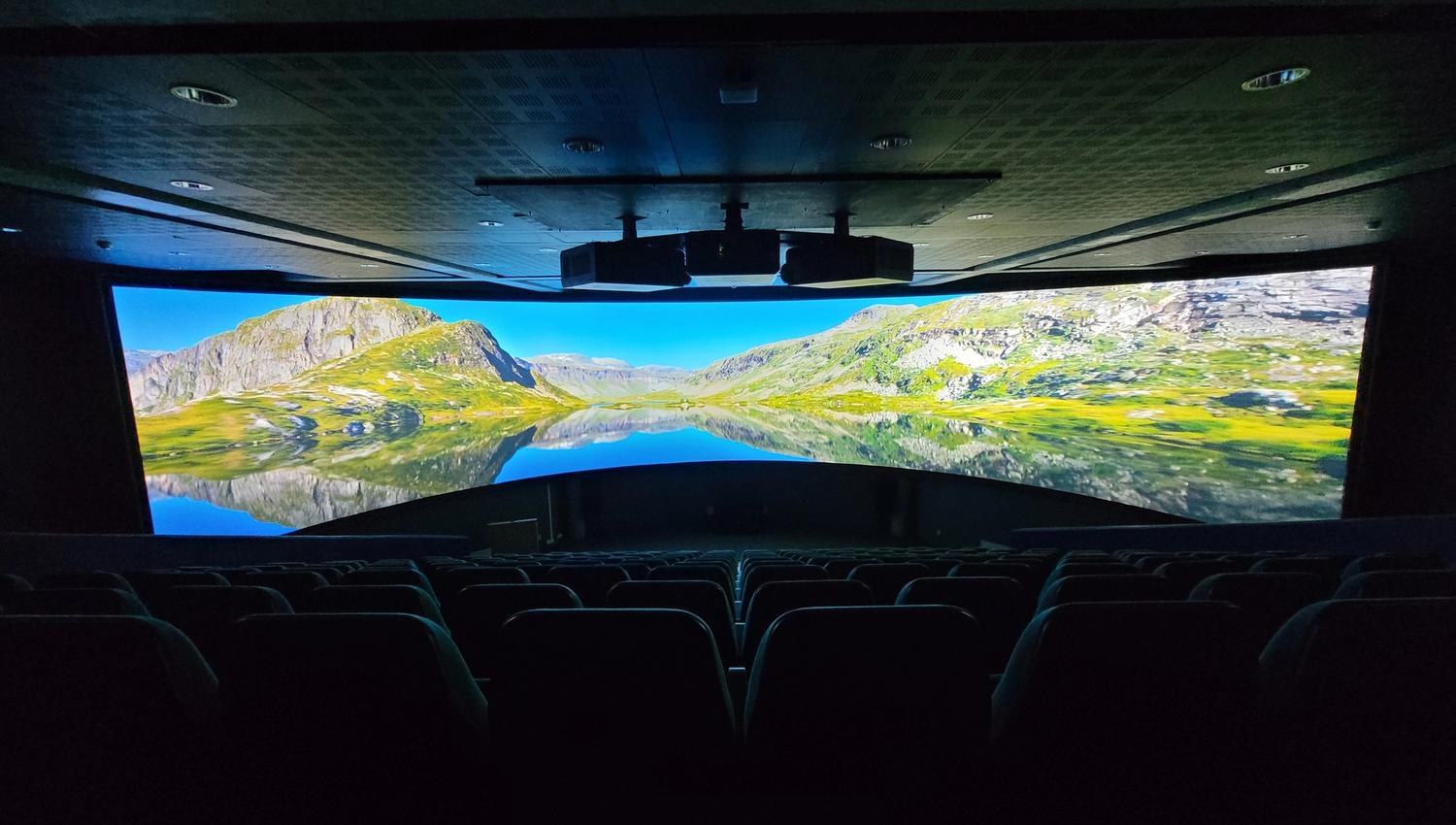 A photo of the panorama movie screen inside the cinema.