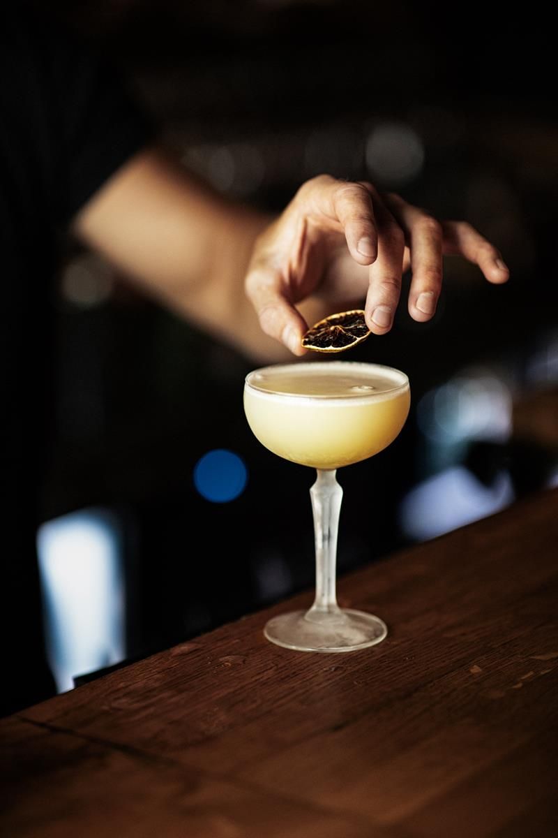 Detail photo of a drink being prepared.