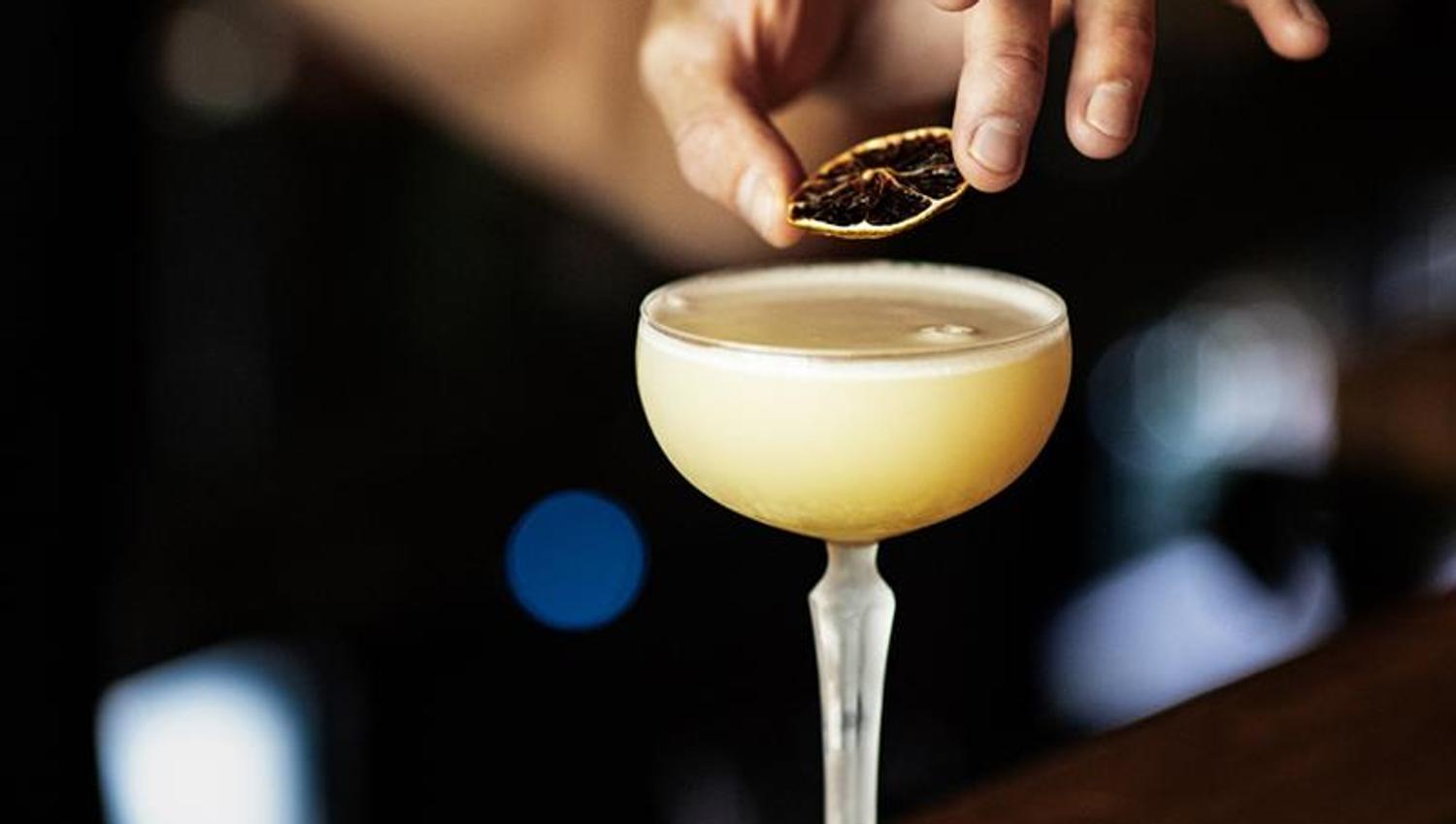 Detail photo of a drink being prepared.