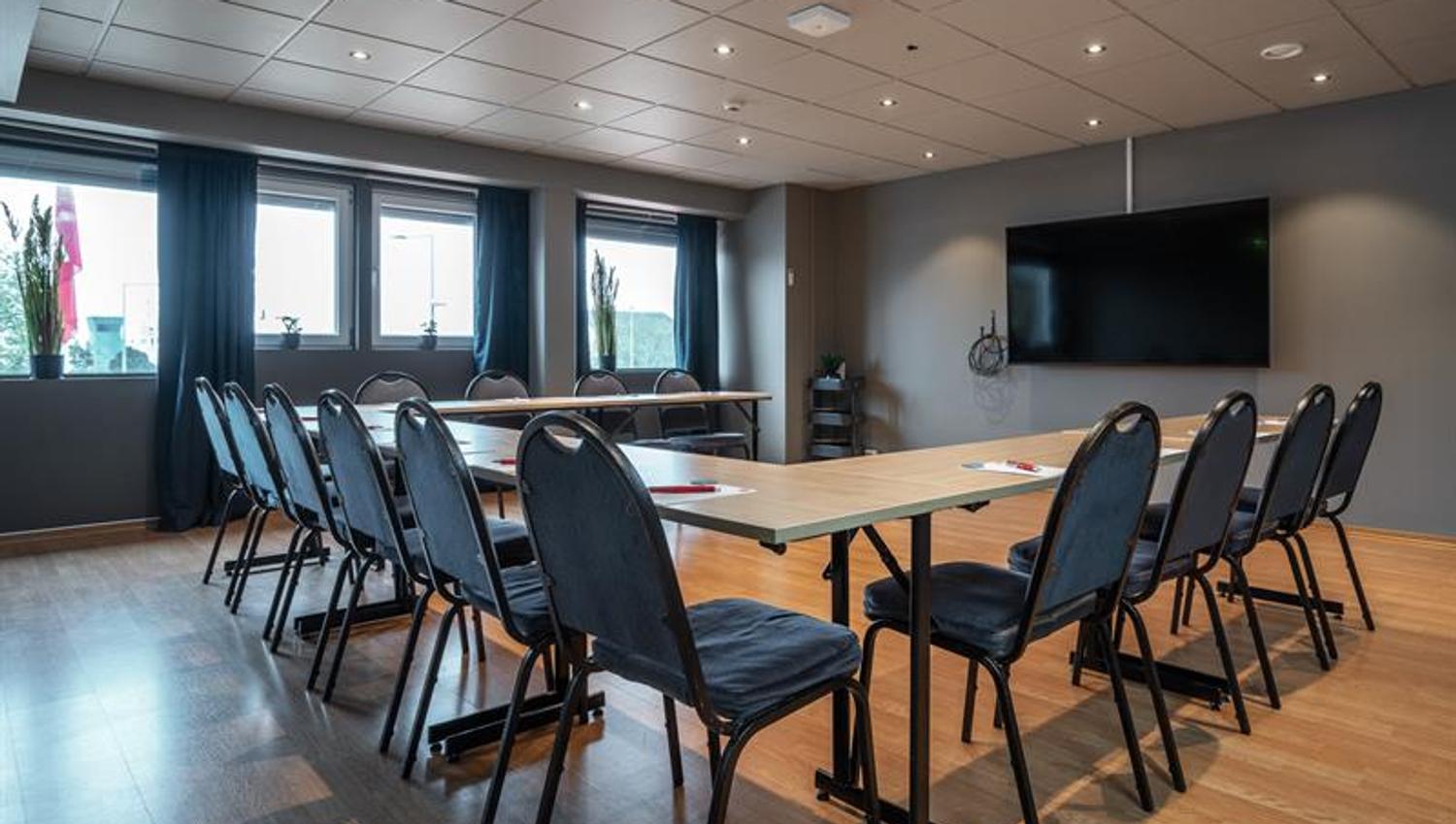 Møterom med U-oppsett