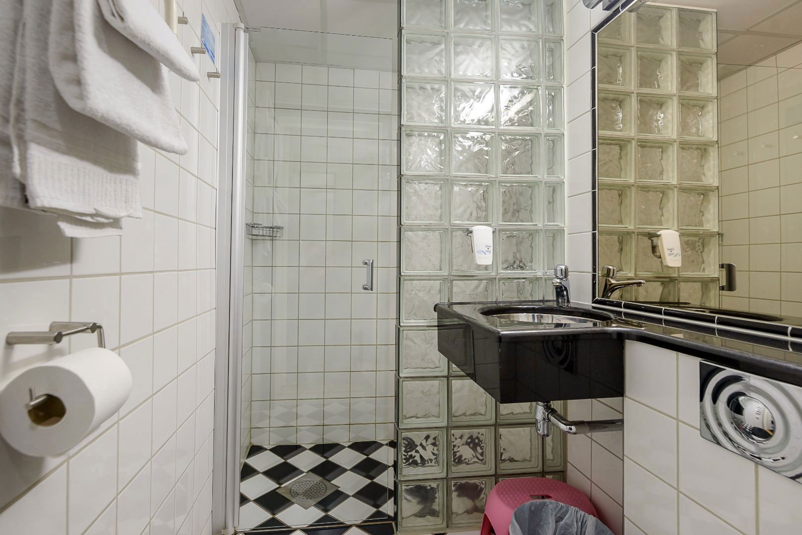 A bathroom with sink and WC