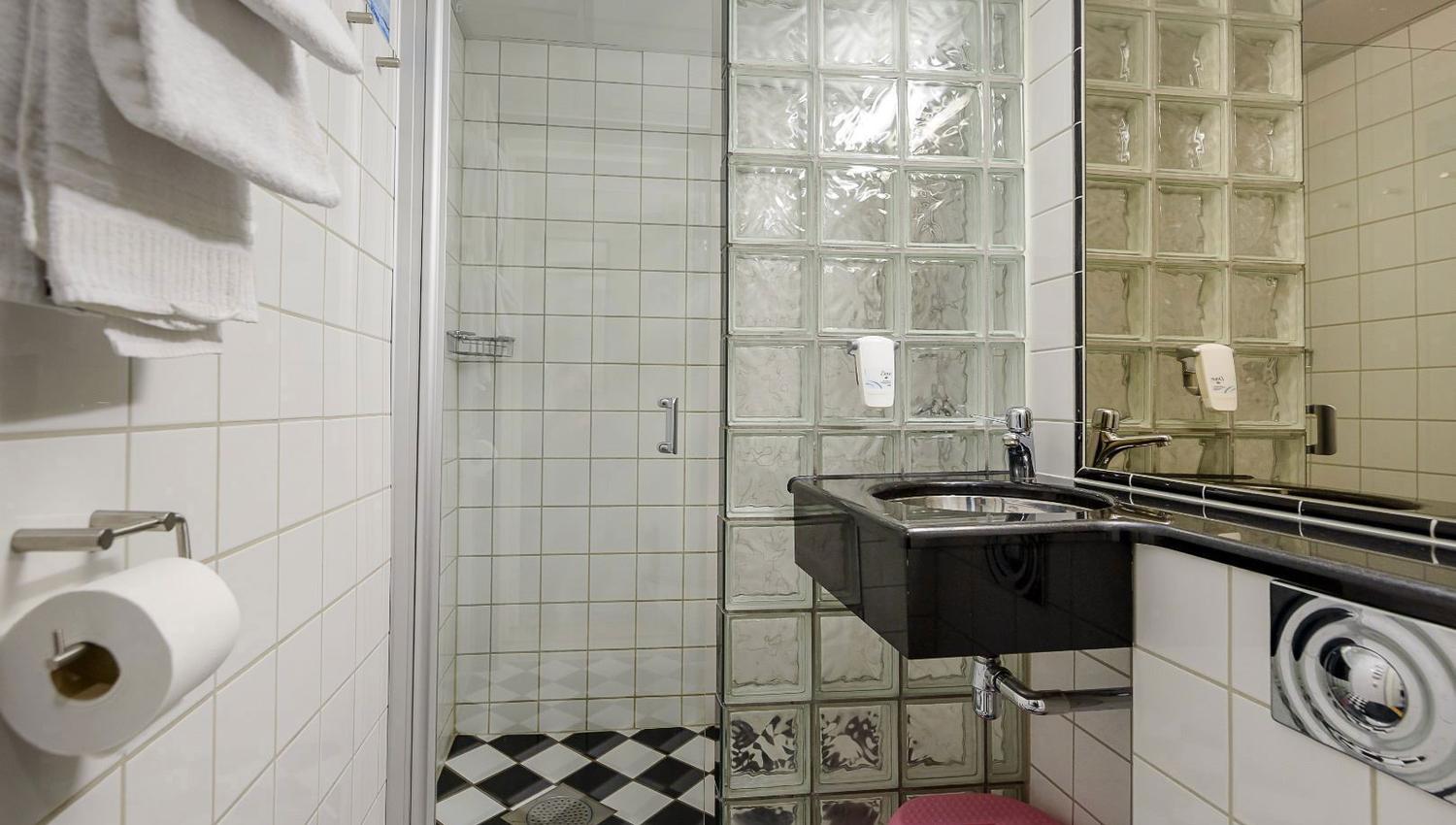 A bathroom with sink and WC