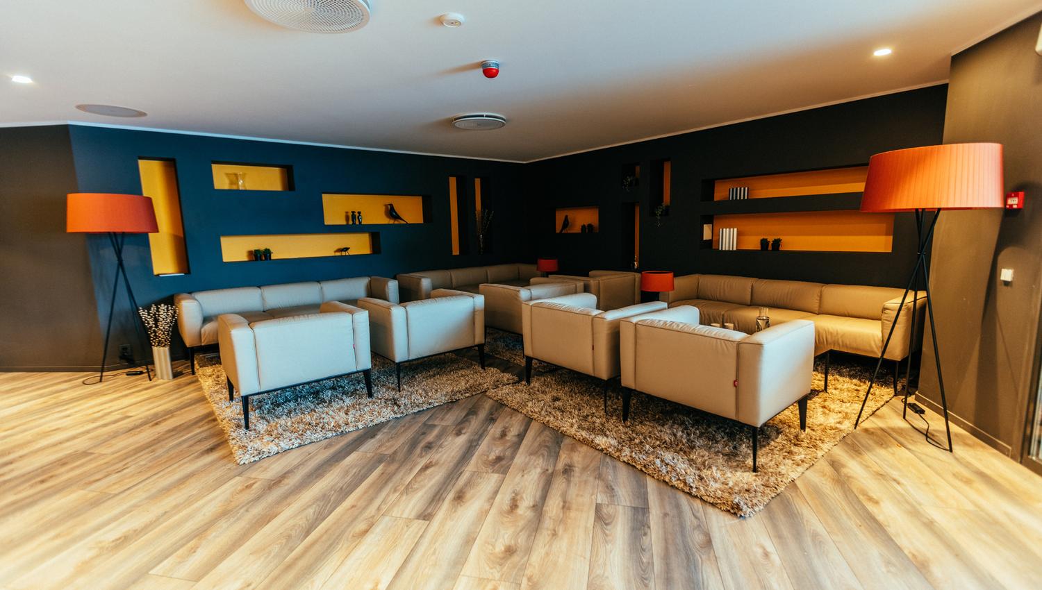 Modern lounge area with comfortable seating at Hardanger House.