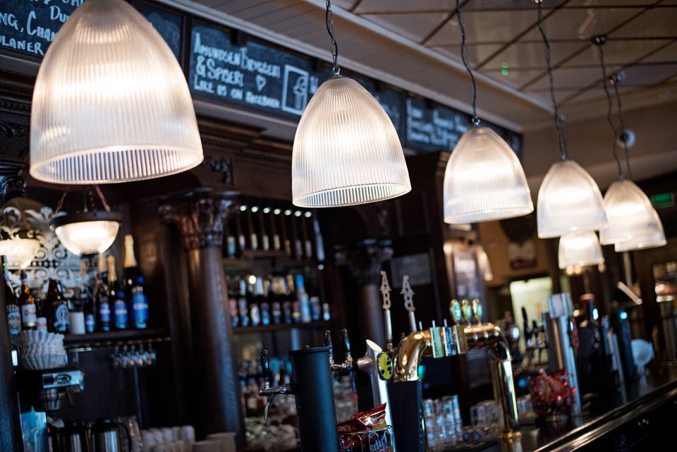 Have dinner and a drink at the bar.