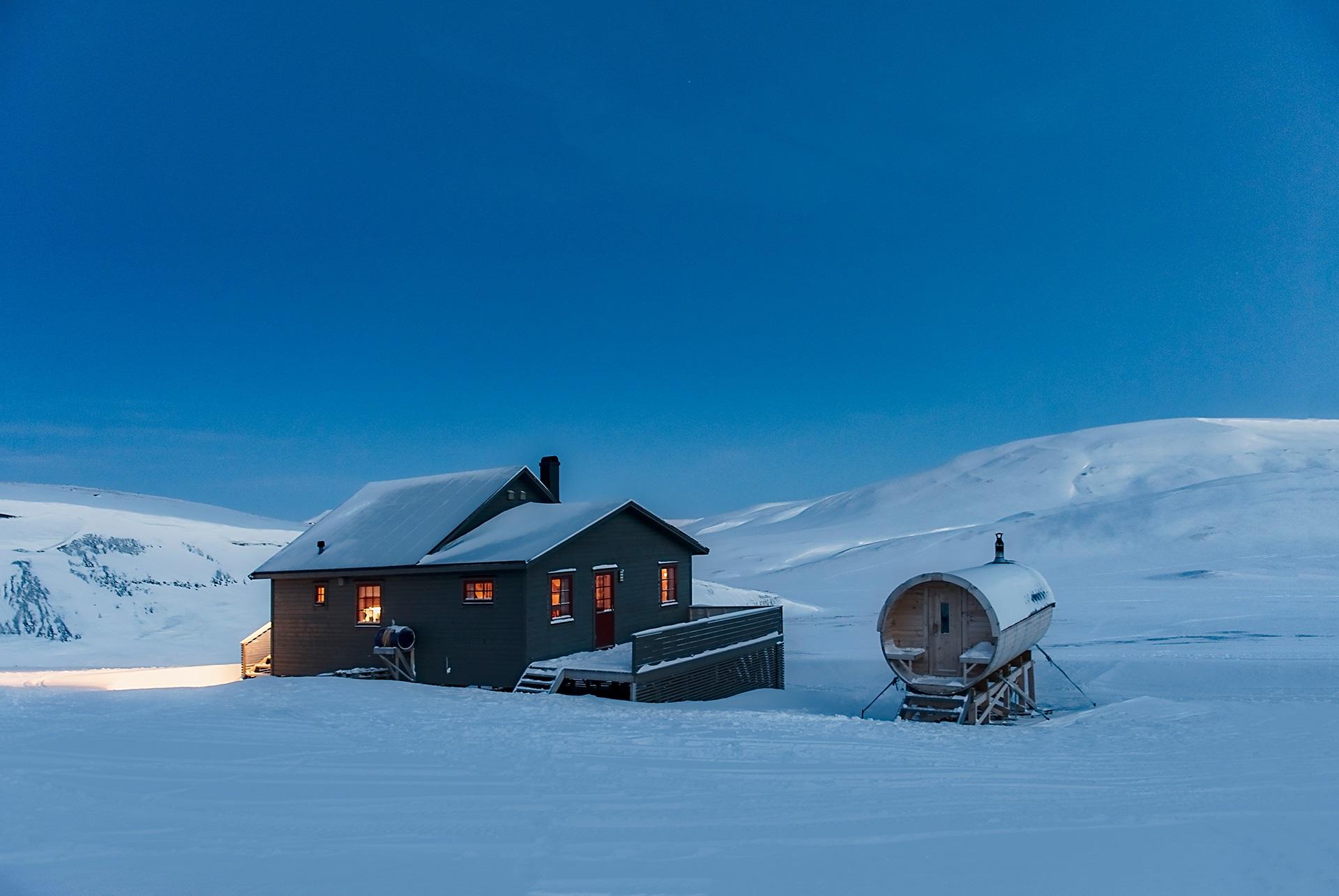 Juva Cabin underneath a blue sky