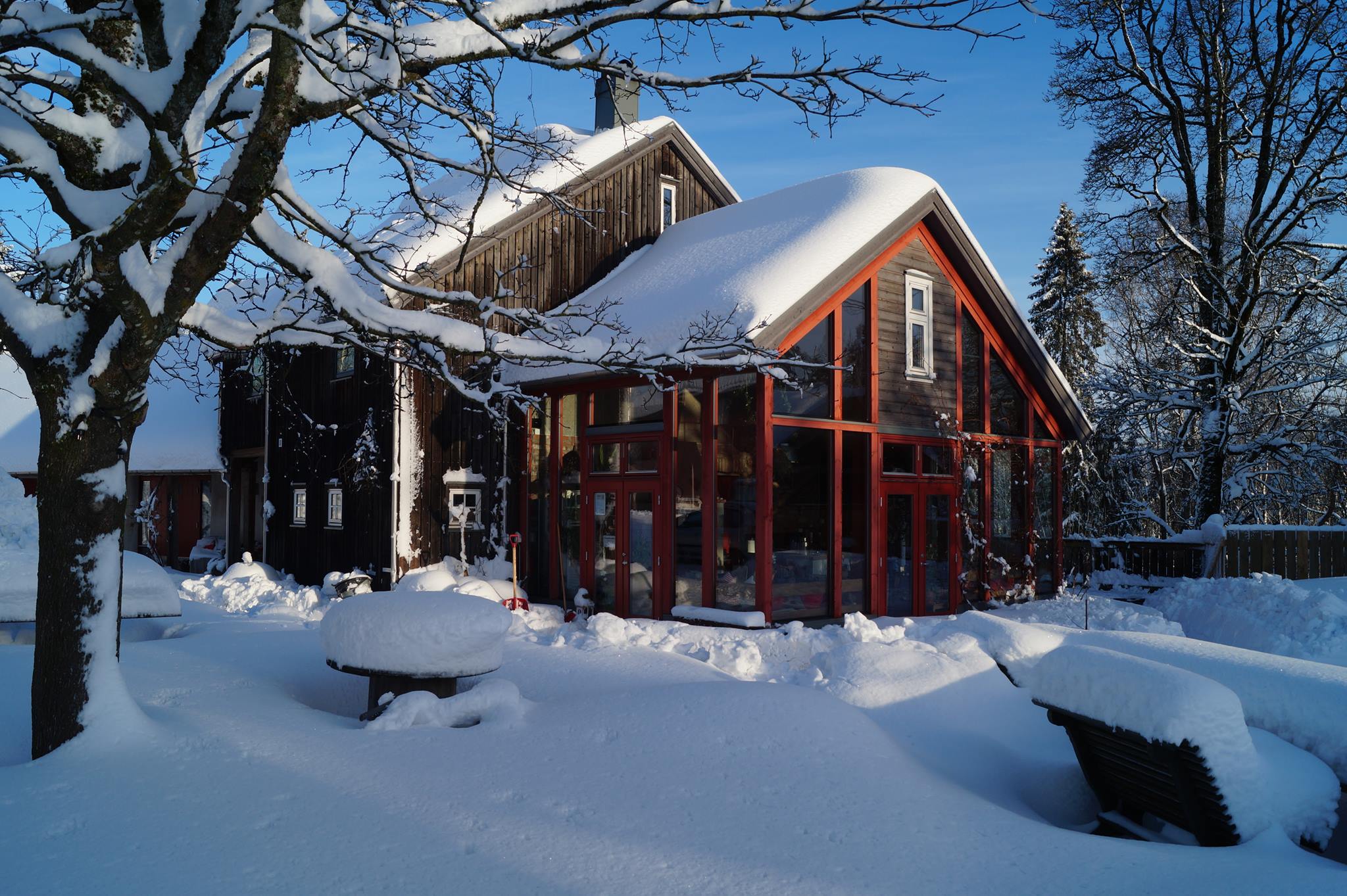 Farmhouse in winter. snow and houses.