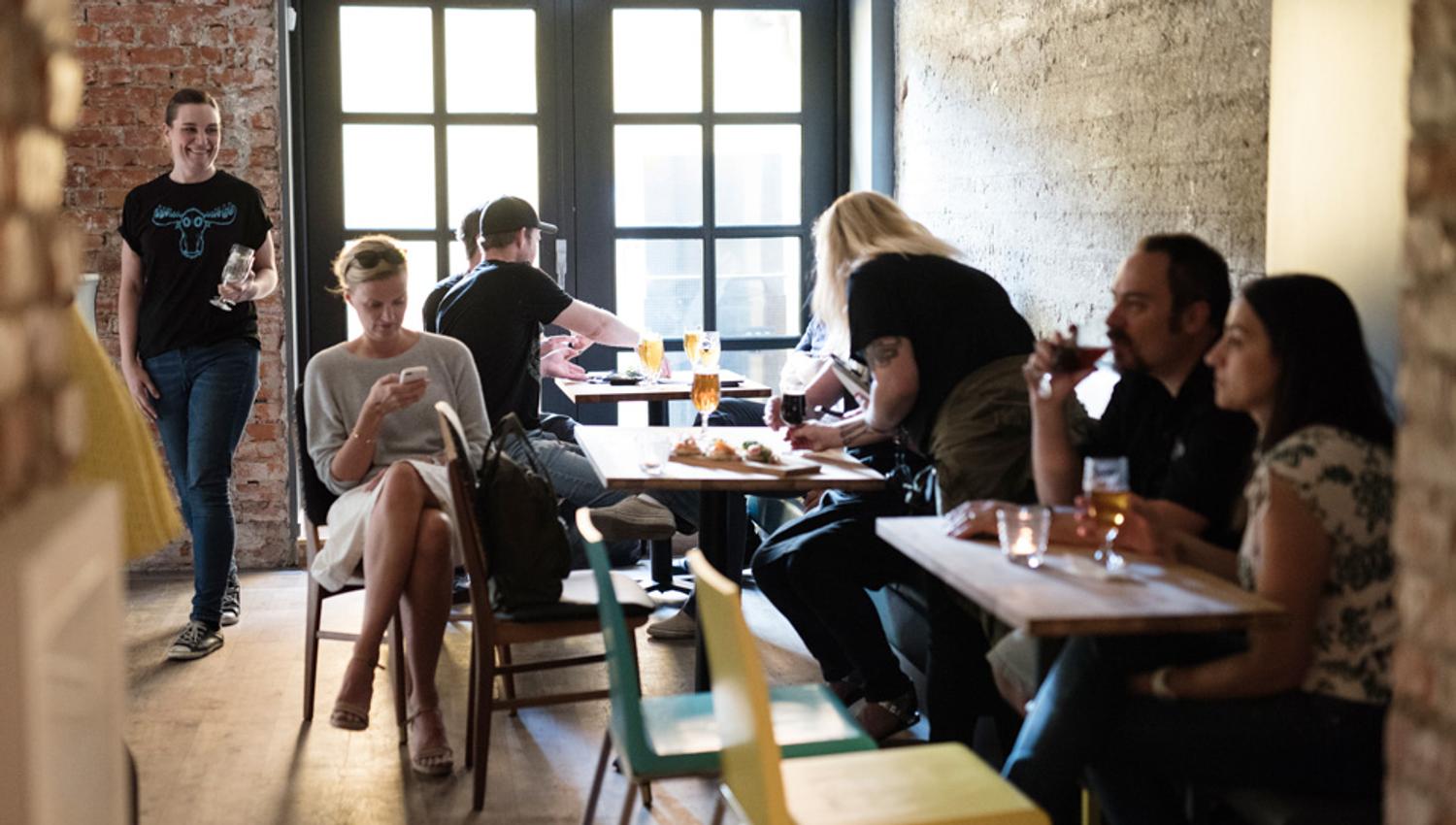 Interior photo of people drinking.