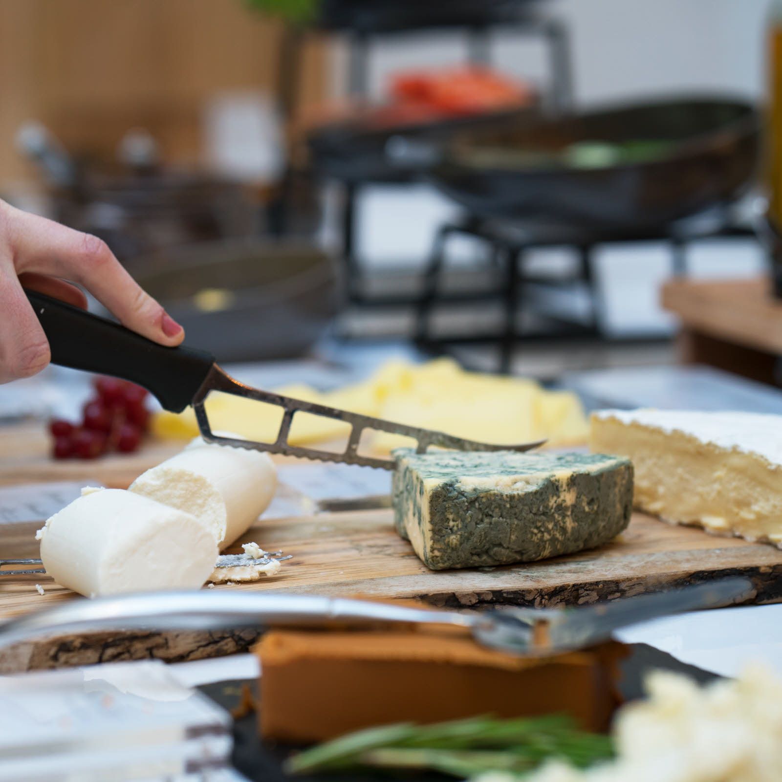 Cheese buffet and cheese knife Thon Hotel Terminus in Oslo. Photo.