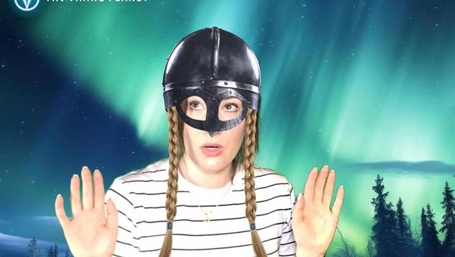 Lady wearing a viking helmet