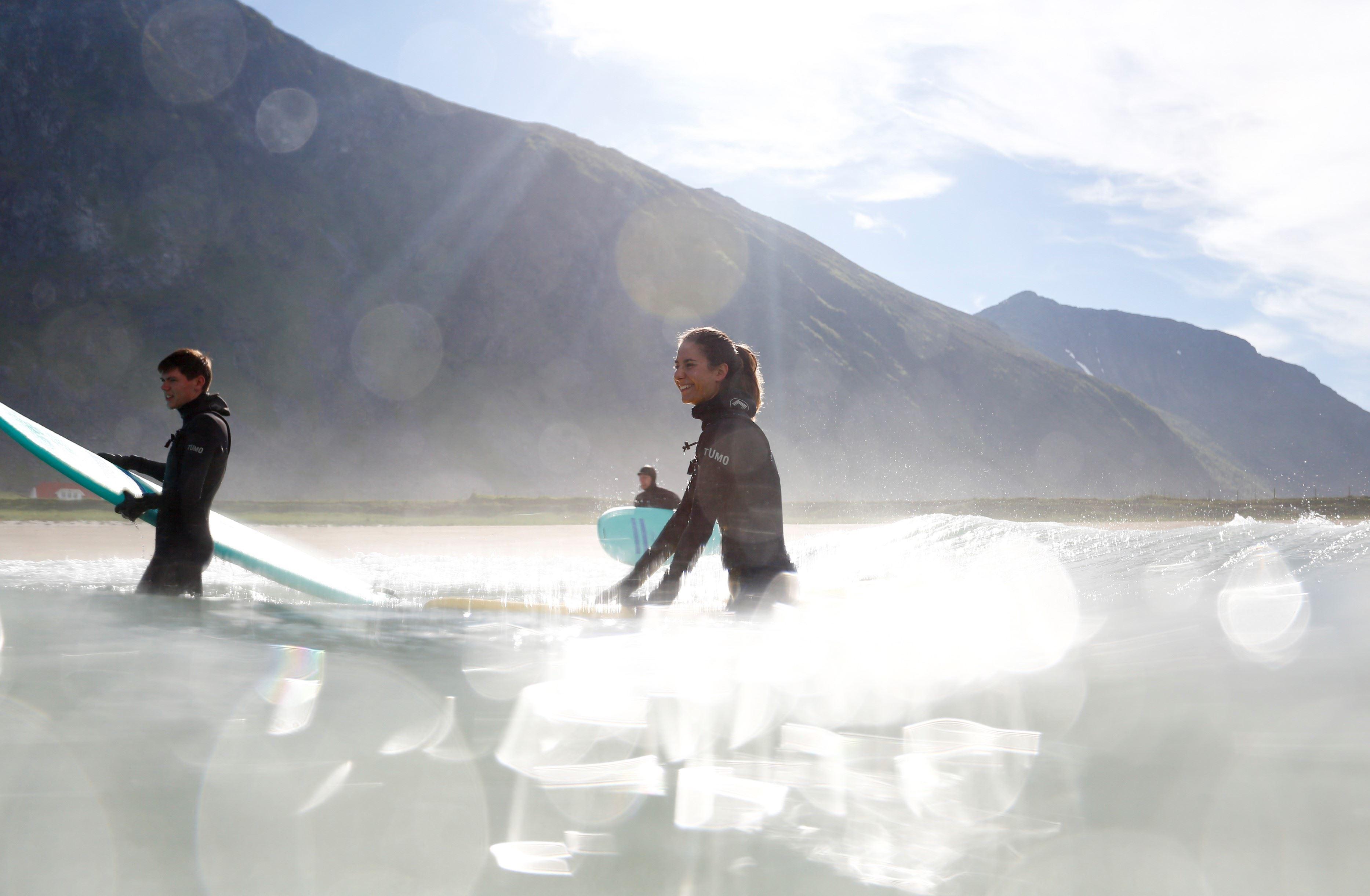 Beginner Surf Lesson with Professional Photographer - Unstad Arctic Surf