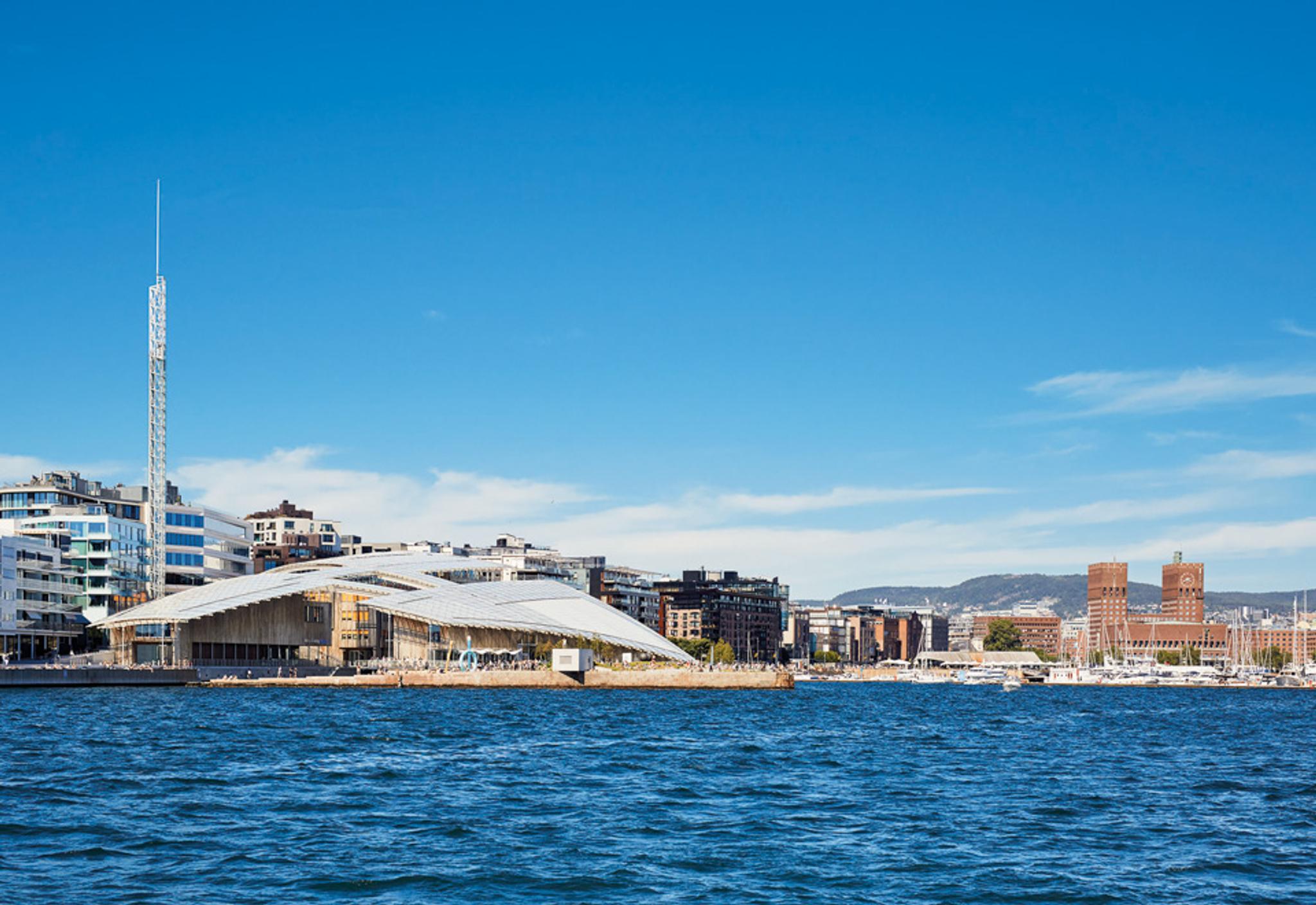 The Astrup Fearnley Museum seen from the fjord. Aker Brygge and the City Hall in the background