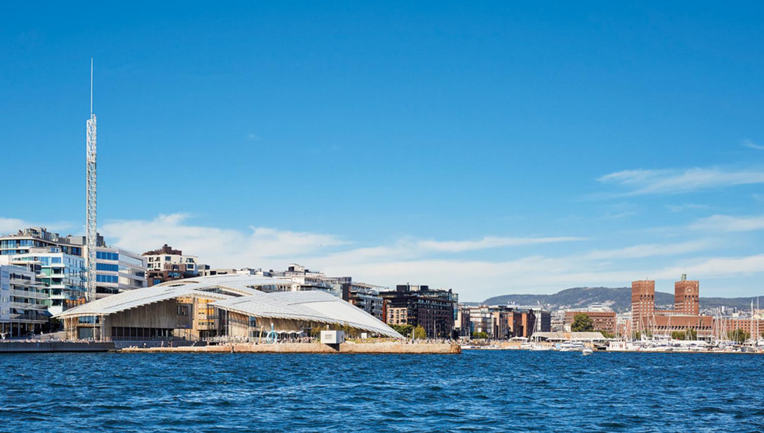 The Astrup Fearnley Museum seen from the fjord. Aker Brygge and the City Hall in the background