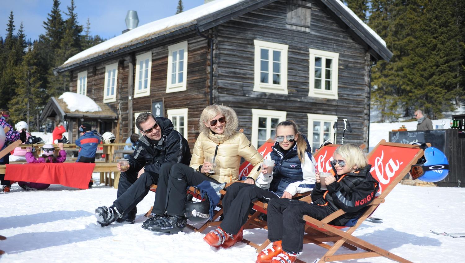 Skiers taking a break in Kvitfjell