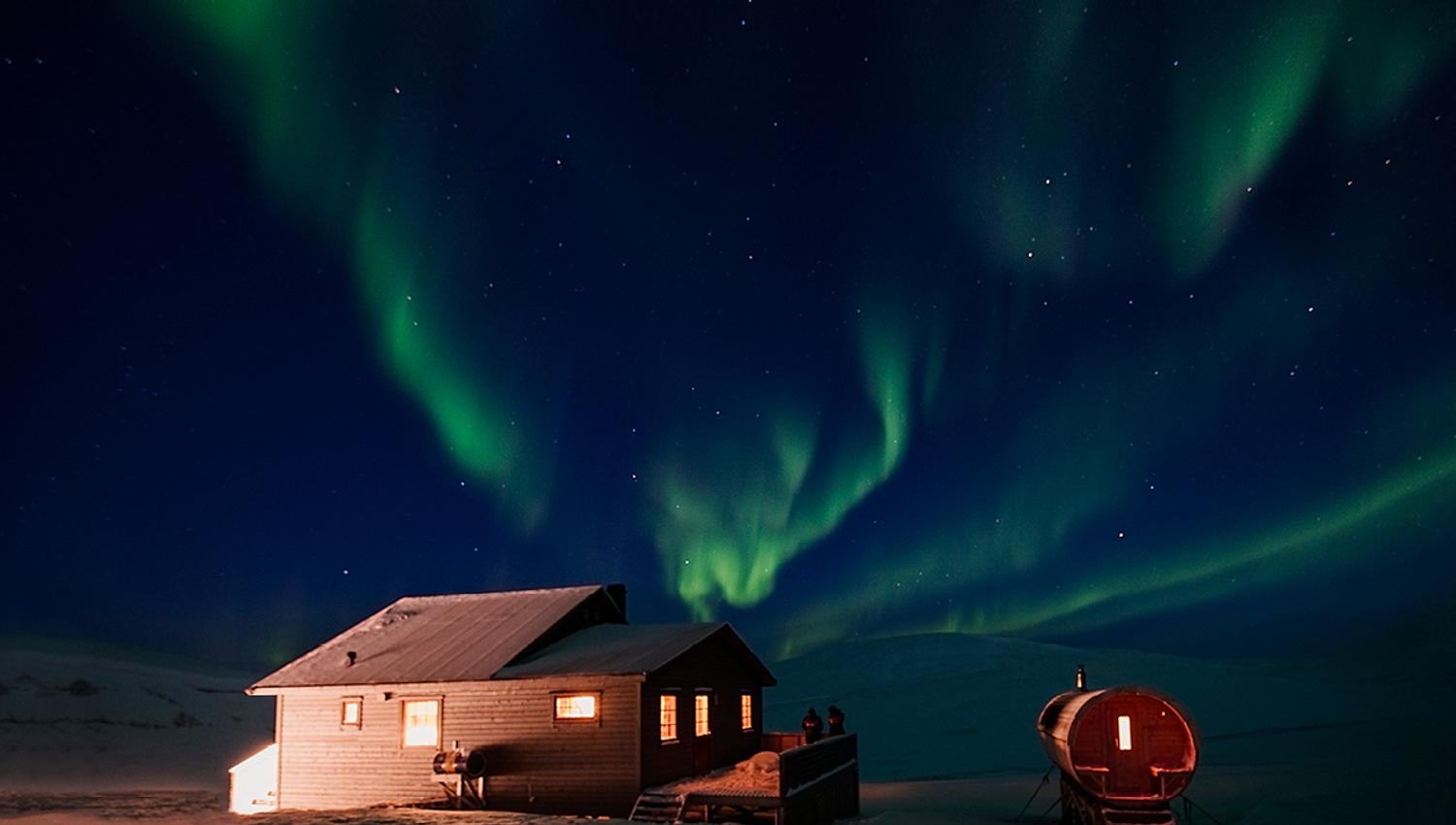 Northern lights above Juva Cabin