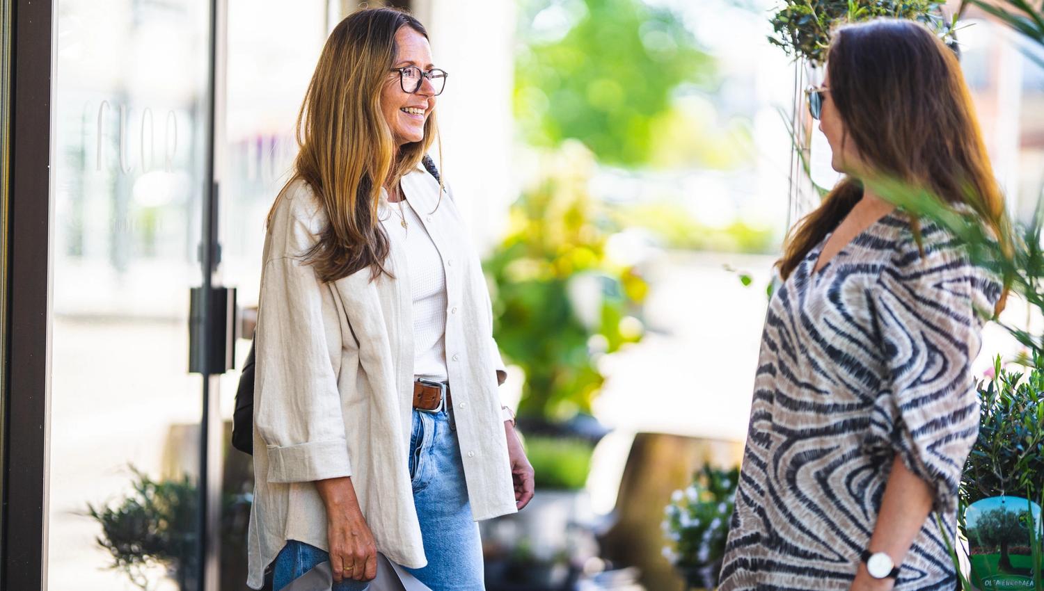 two woman talking