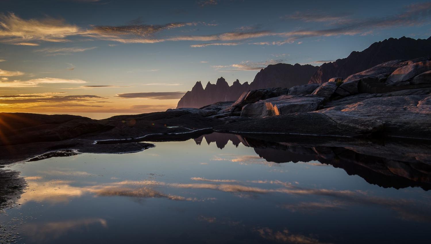 majestic mountains in the midnight sun.