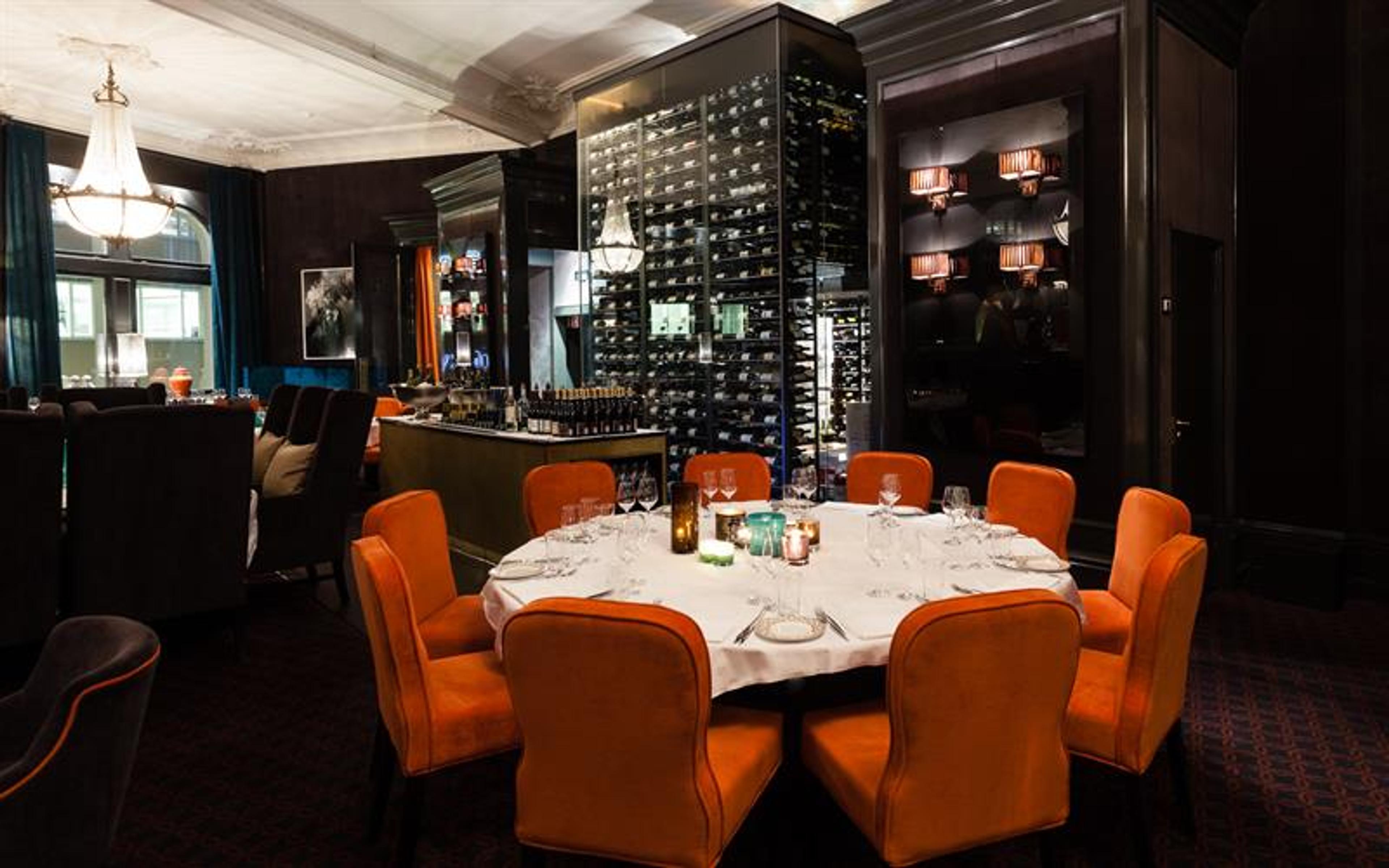 interior of the restaurant with wine cabinet in the background