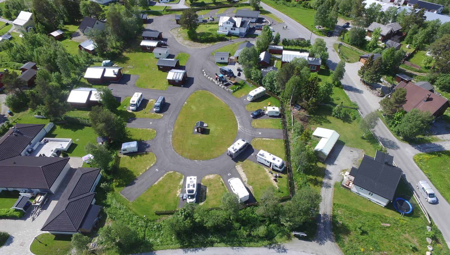 Camping view taken from above with some motorhomes staying on pitches ( summer edition )