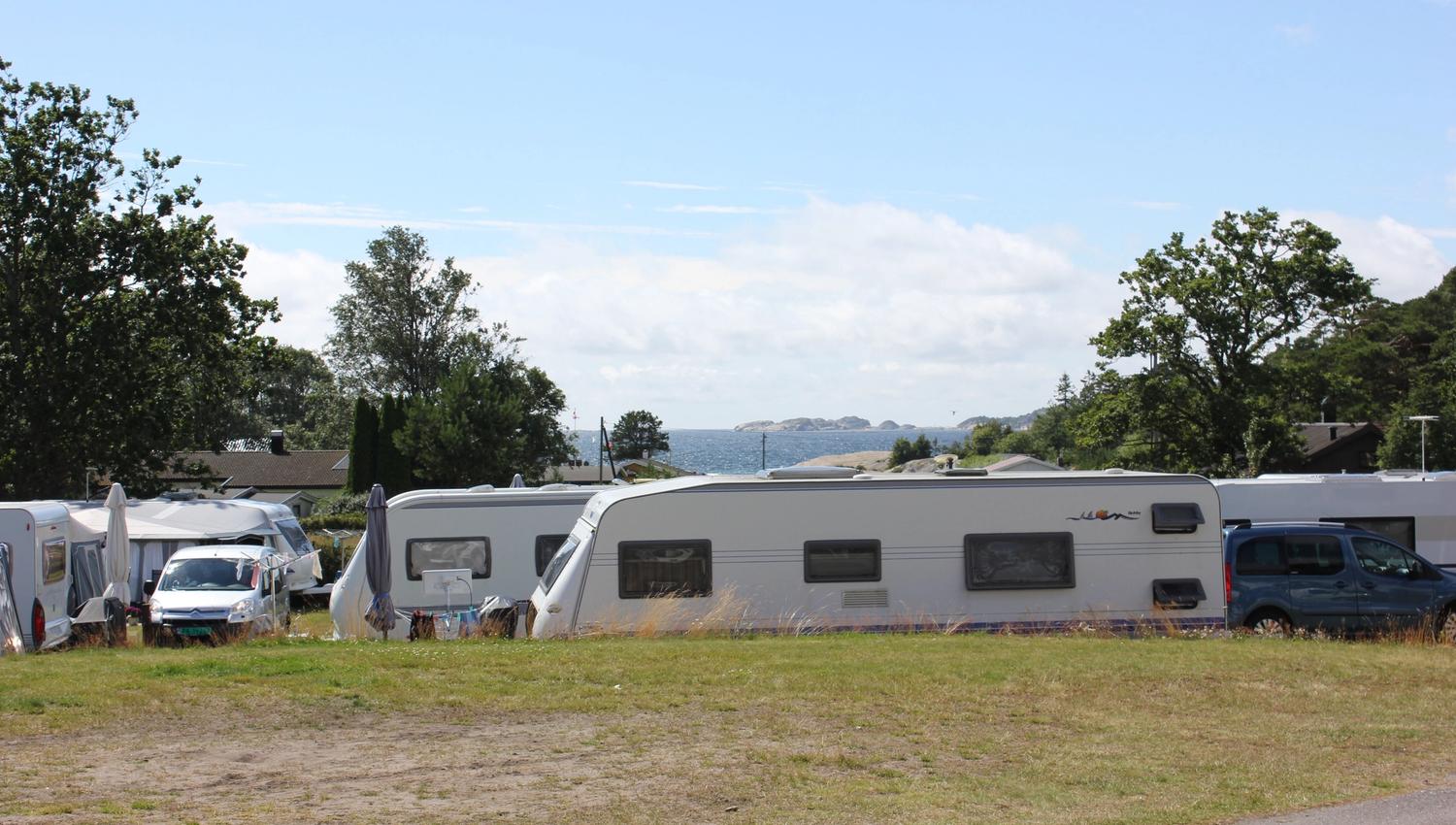 Caravans, sea in the background