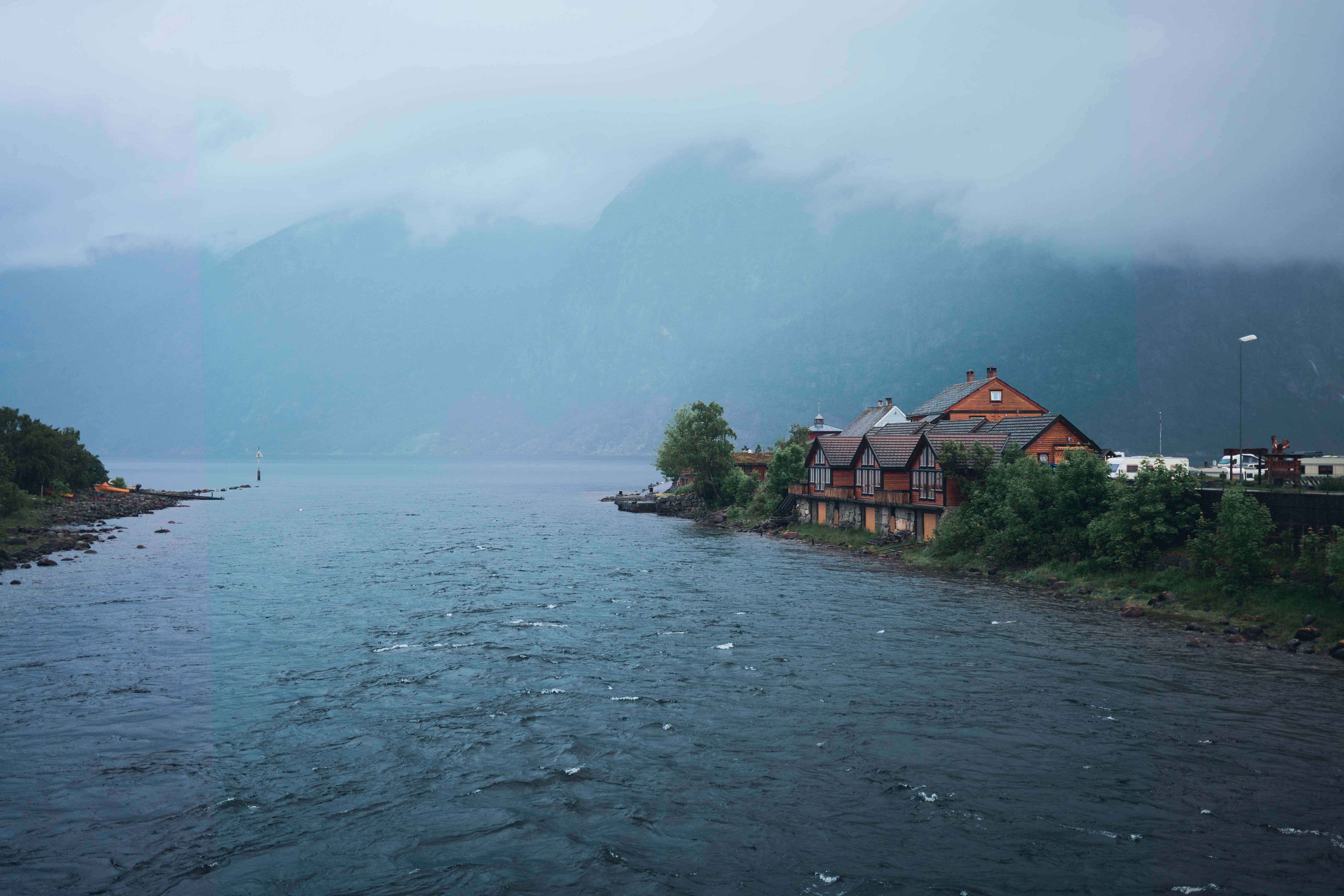 The Eio river with the riverside cabins in the background.