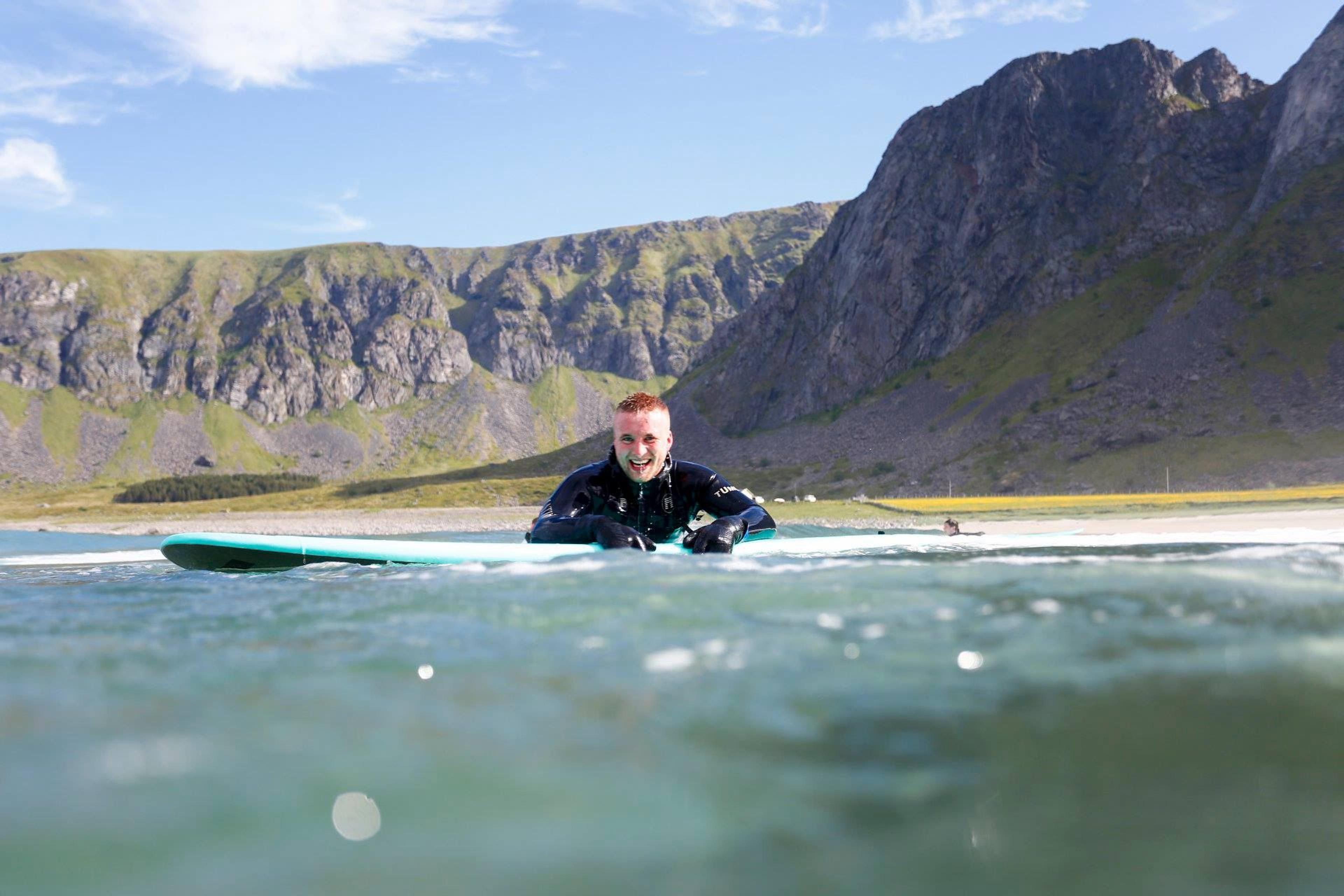 Beginner Surf Lesson with Professional Photographer - Unstad Arctic Surf
