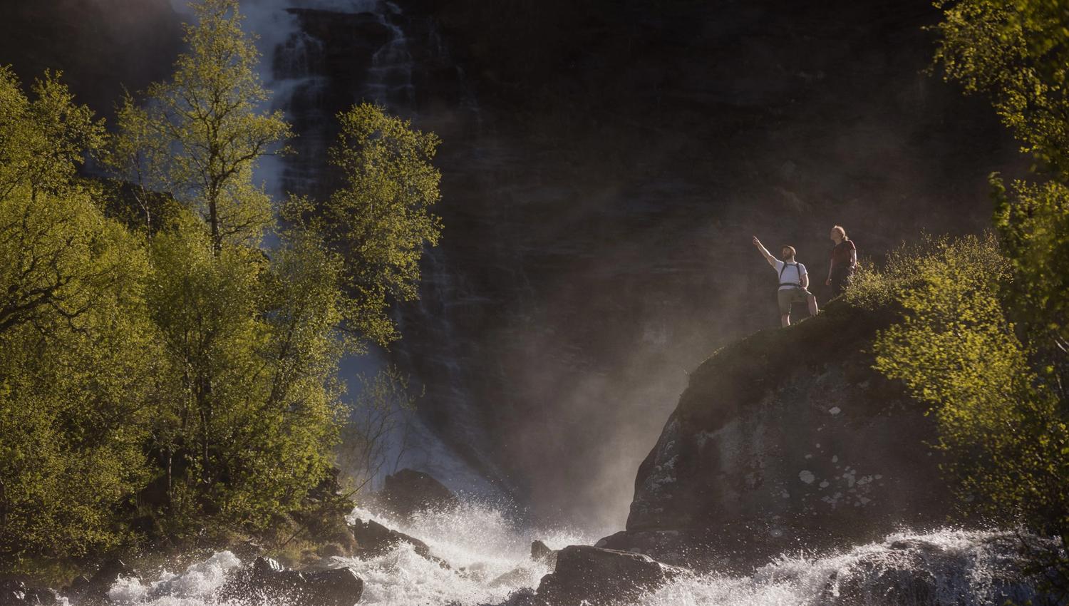 The trip ends below a mighty waterfall