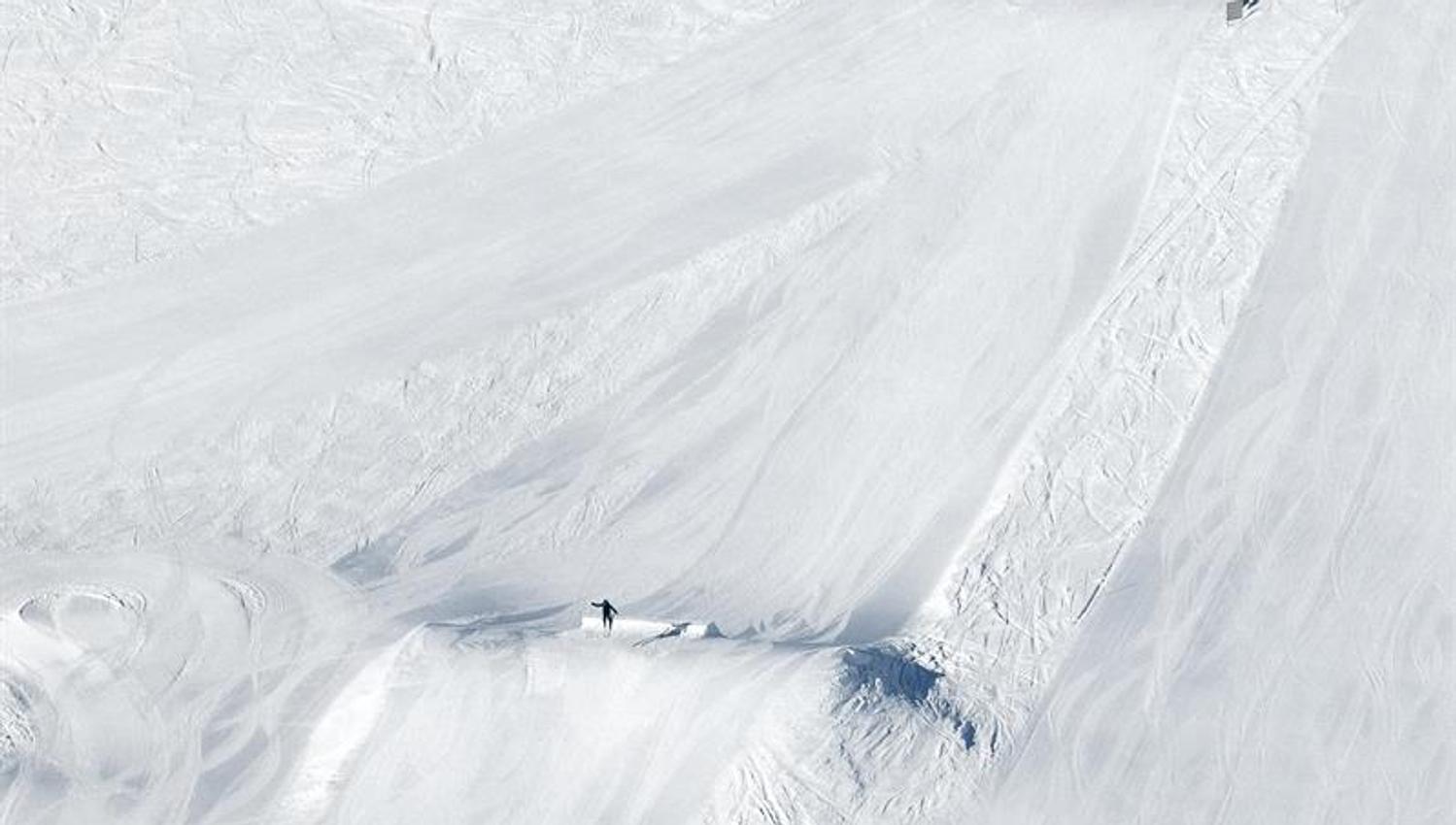 Snow park and ski jumps at Røldal Ski Resort where riders test tricks and jumps.
