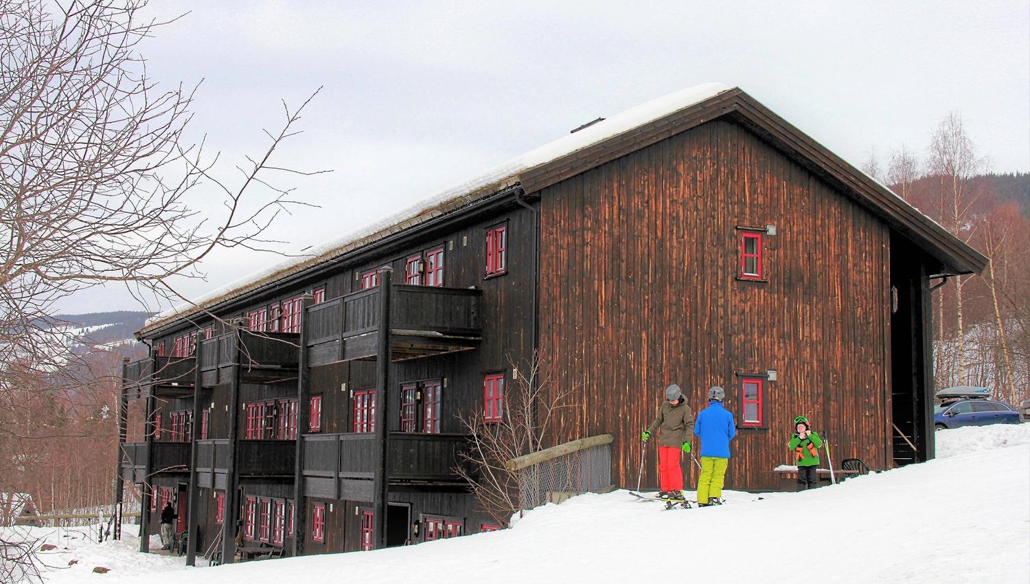 A group of people standing outside a building.