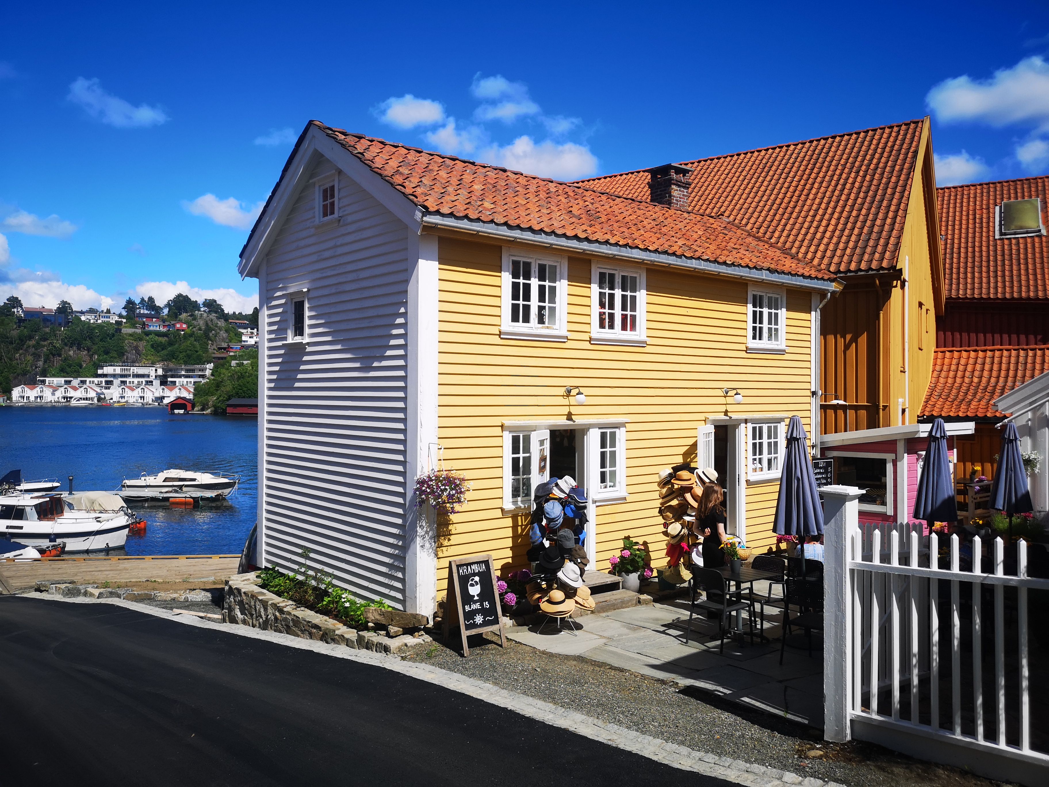 Yellow House with Red Roof - A Colorful Architectural Wonder