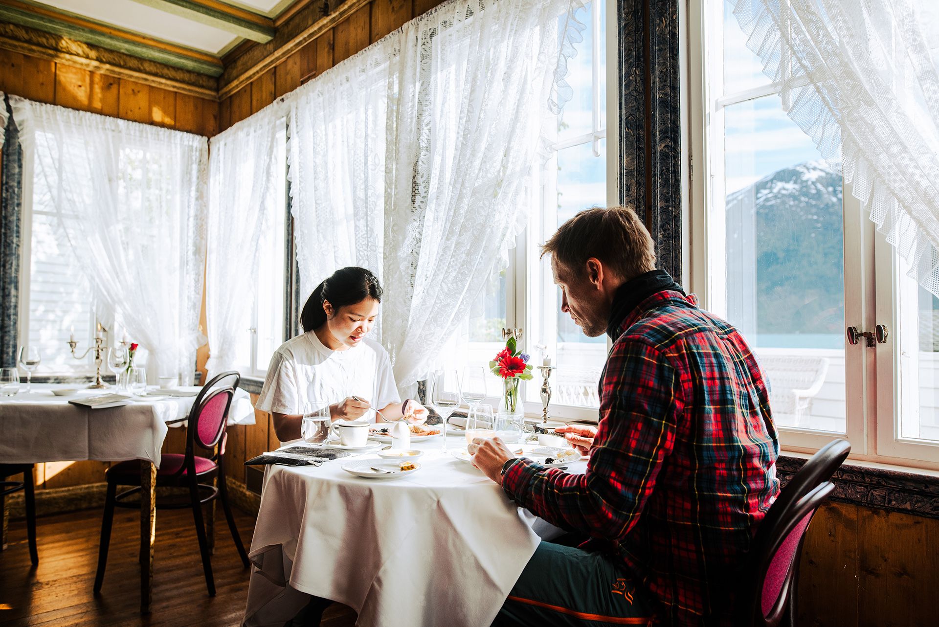 A delightful breakfast with a panoramic view of the Hardangerfjord at Utne Hotel.
