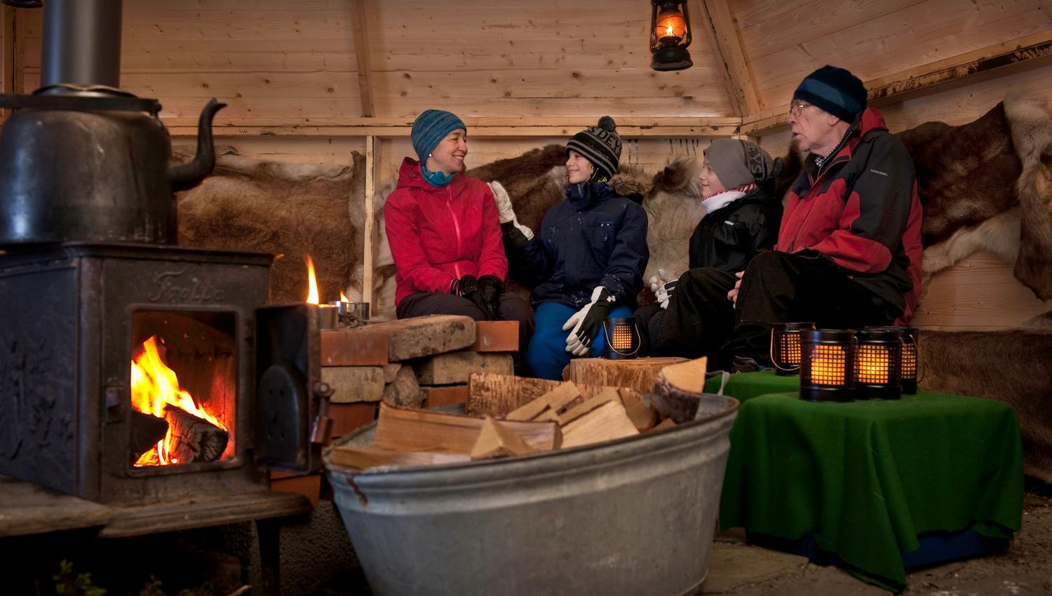 Cozy inside the lavvo after sleigh rides