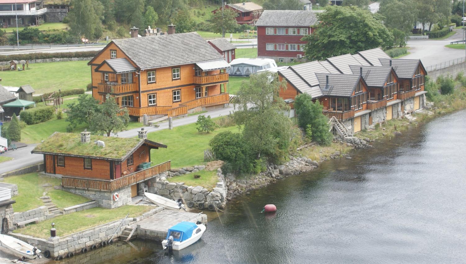 A drone photo showing the camping area next to the river.
