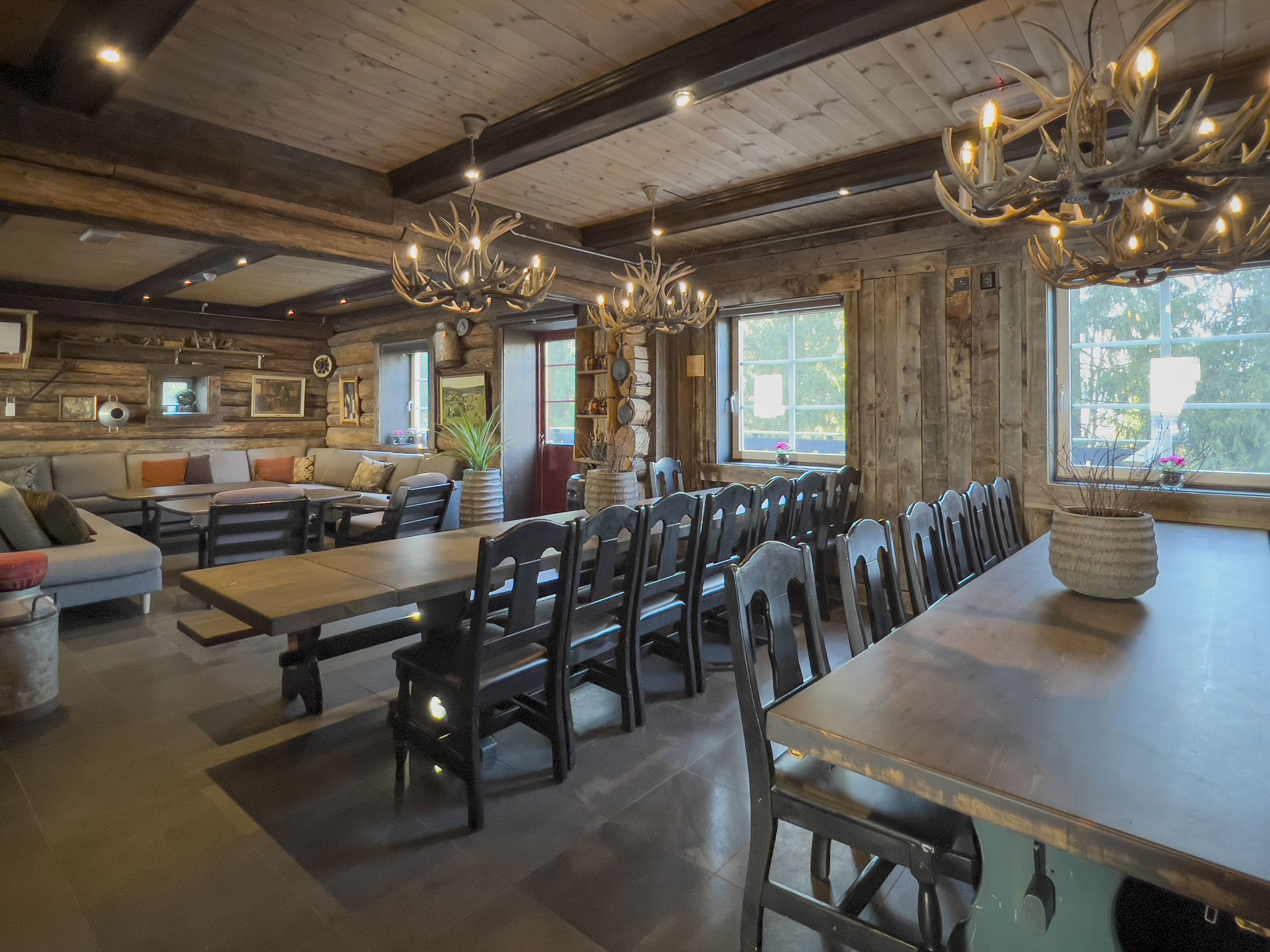 Living room with a large table and chairs.