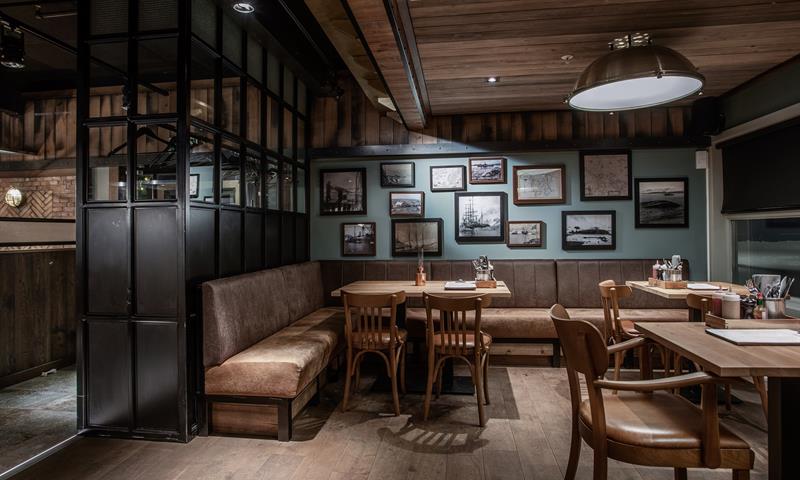 Seating in the restaurant with couches and chairs