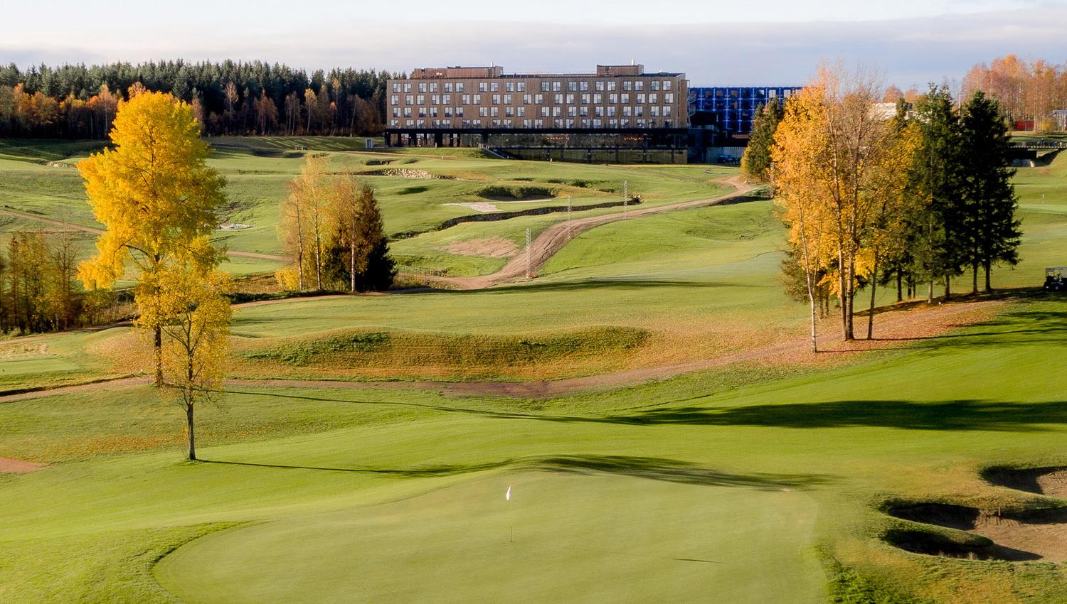 Golf green with the hotel in the background