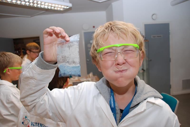 A boy tests out different chemical substances at the Science Centre