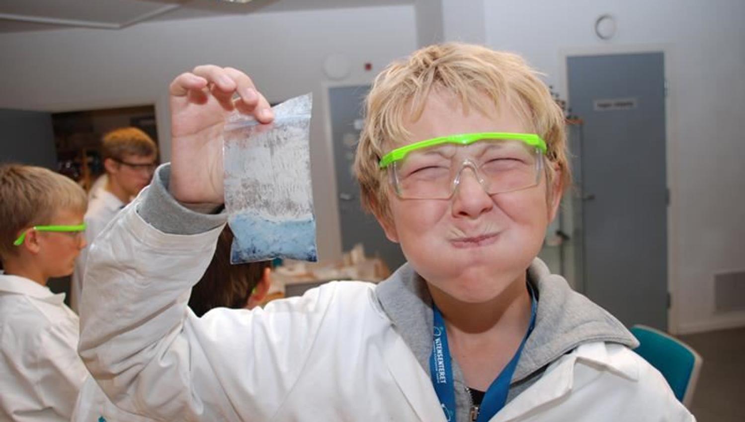 A boy tests out different chemical substances at the Science Centre