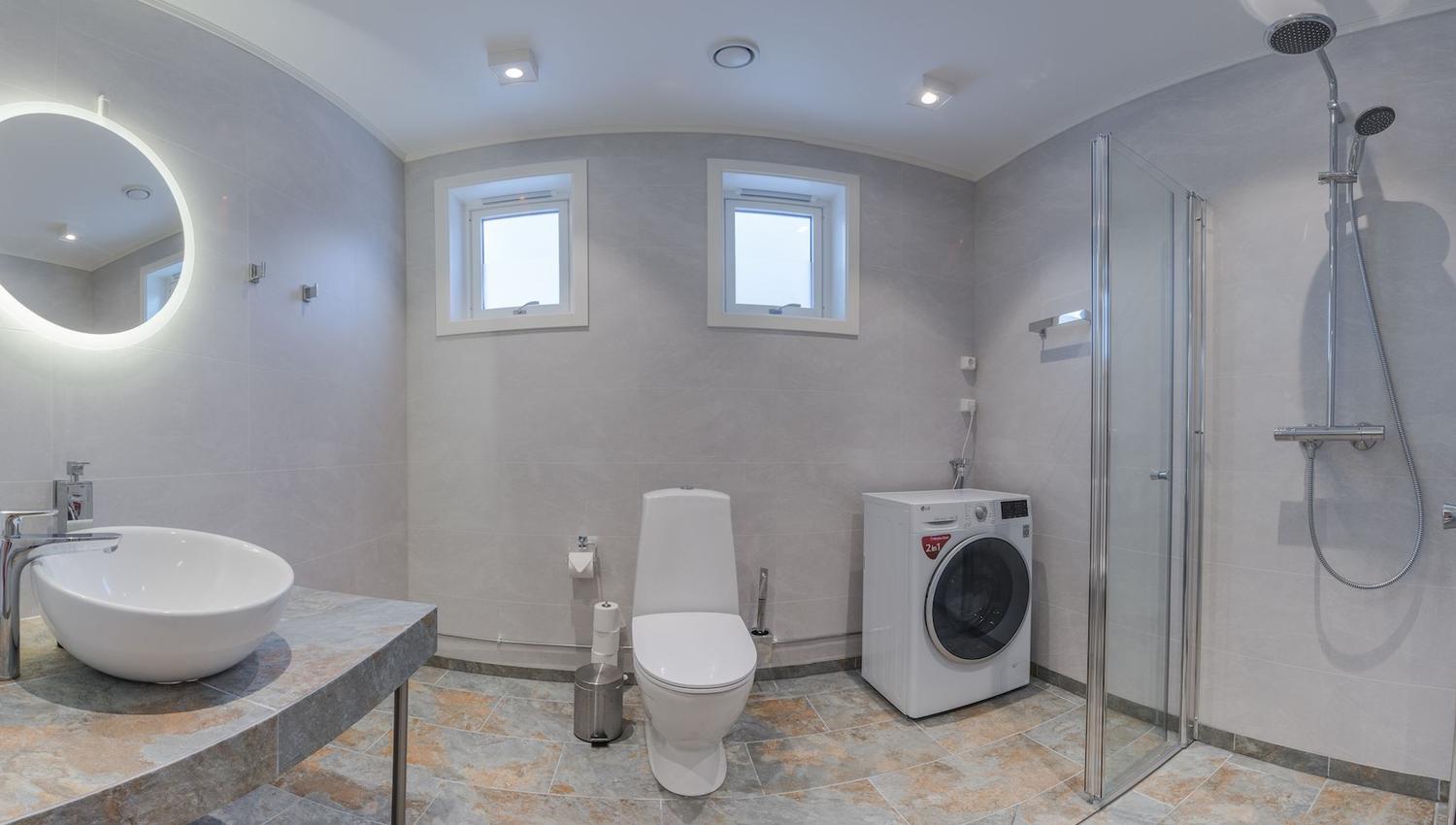 Common bathroom with washing machine
