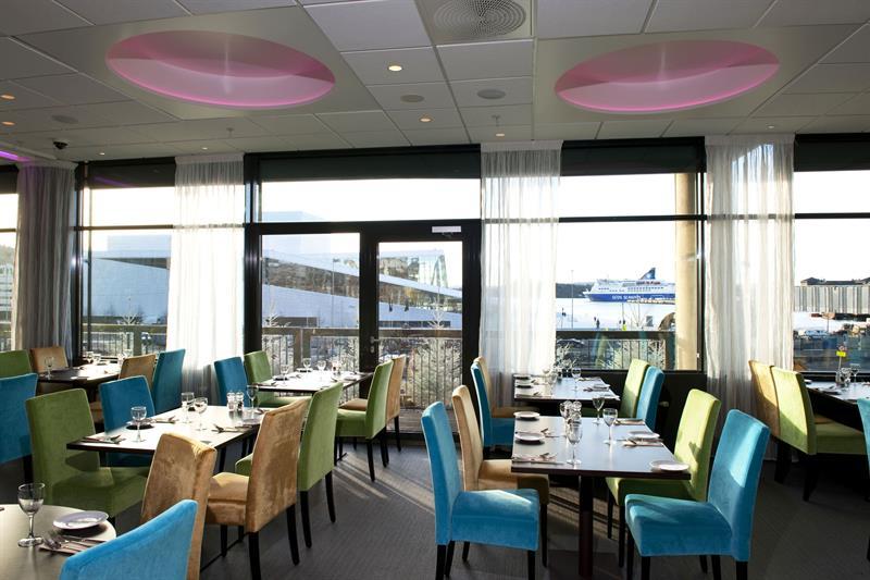 bright restaurant with a view of the opera house