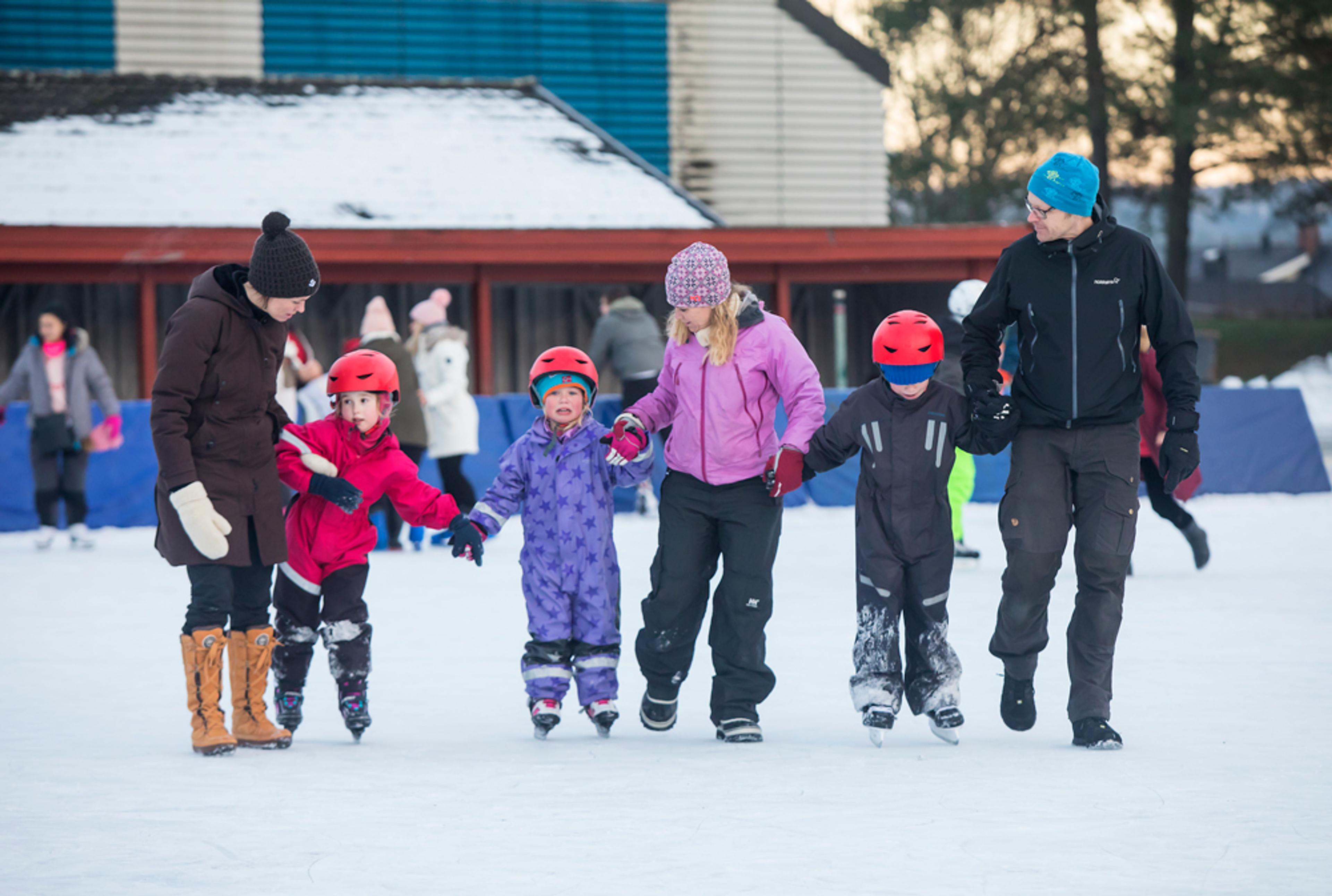 family on the skating rink in Skien leisure park