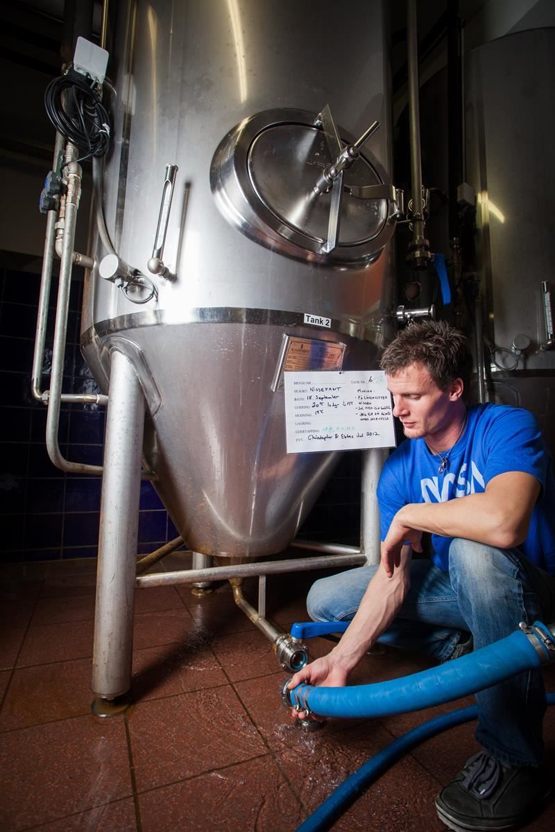 A man steaming beer