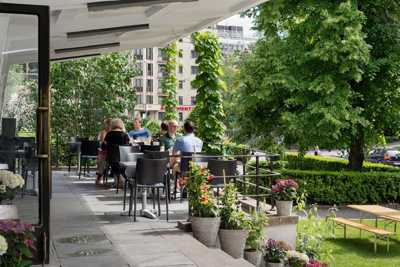 People sitting at the outdoor seating area