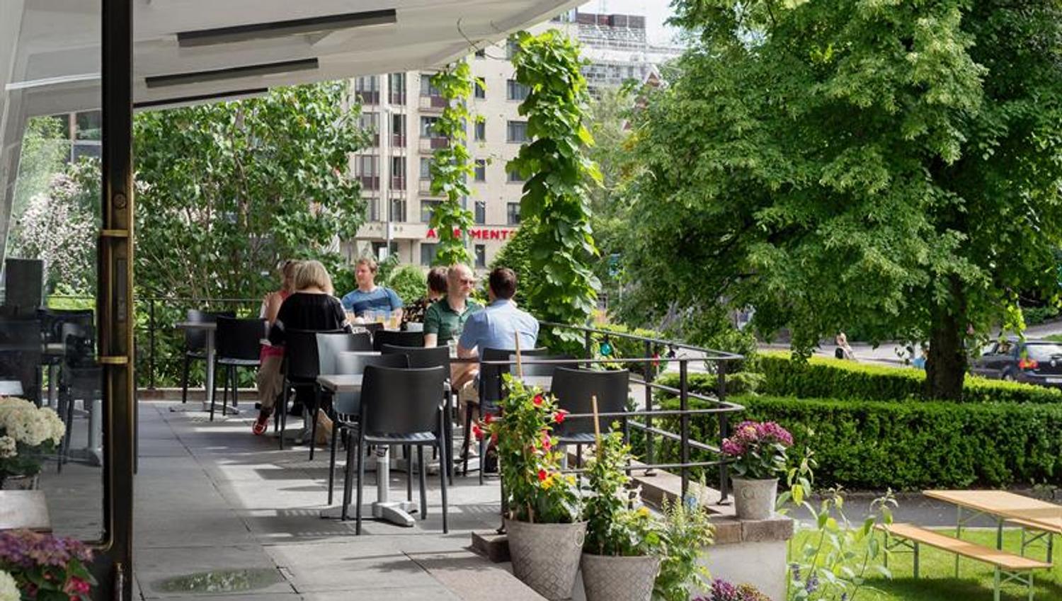 People sitting at the outdoor seating area