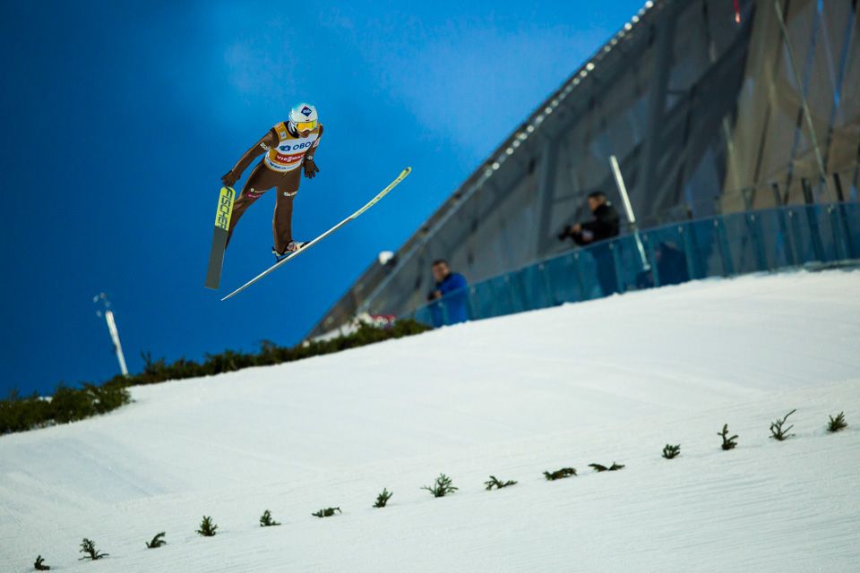 Ski jumper in the air.
