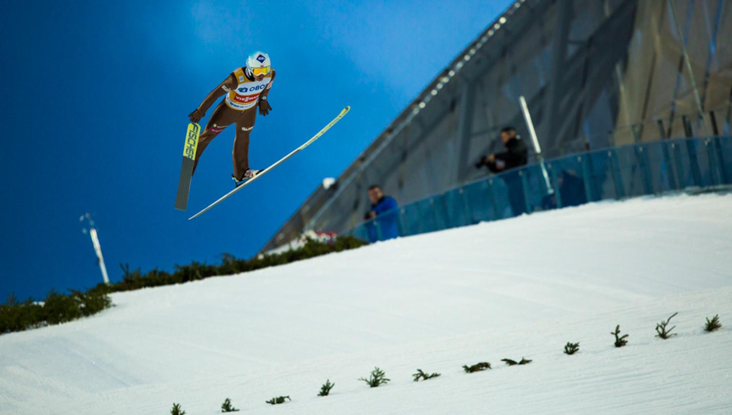 Ski jumper in the air.