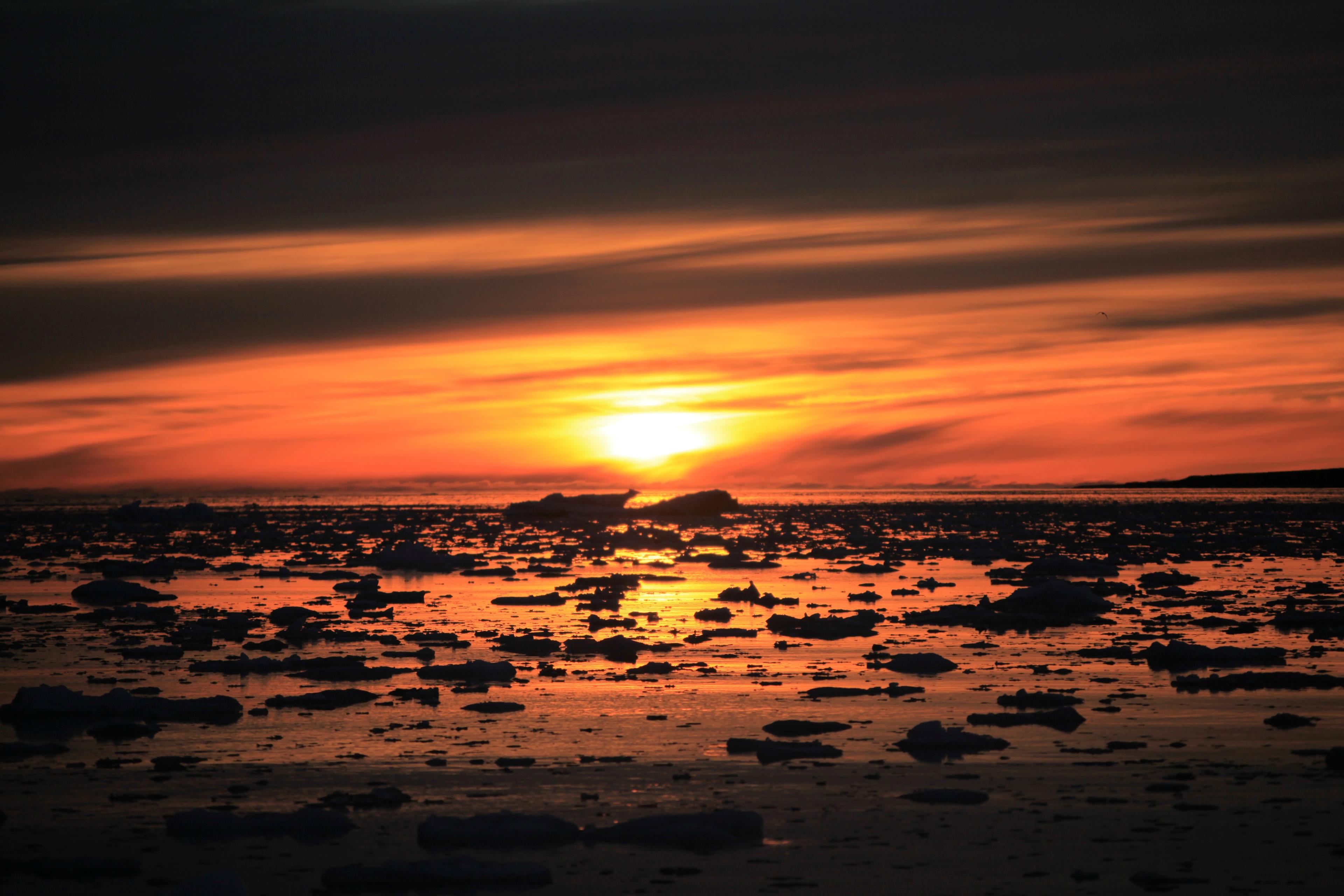 Midnight sun in the horizon