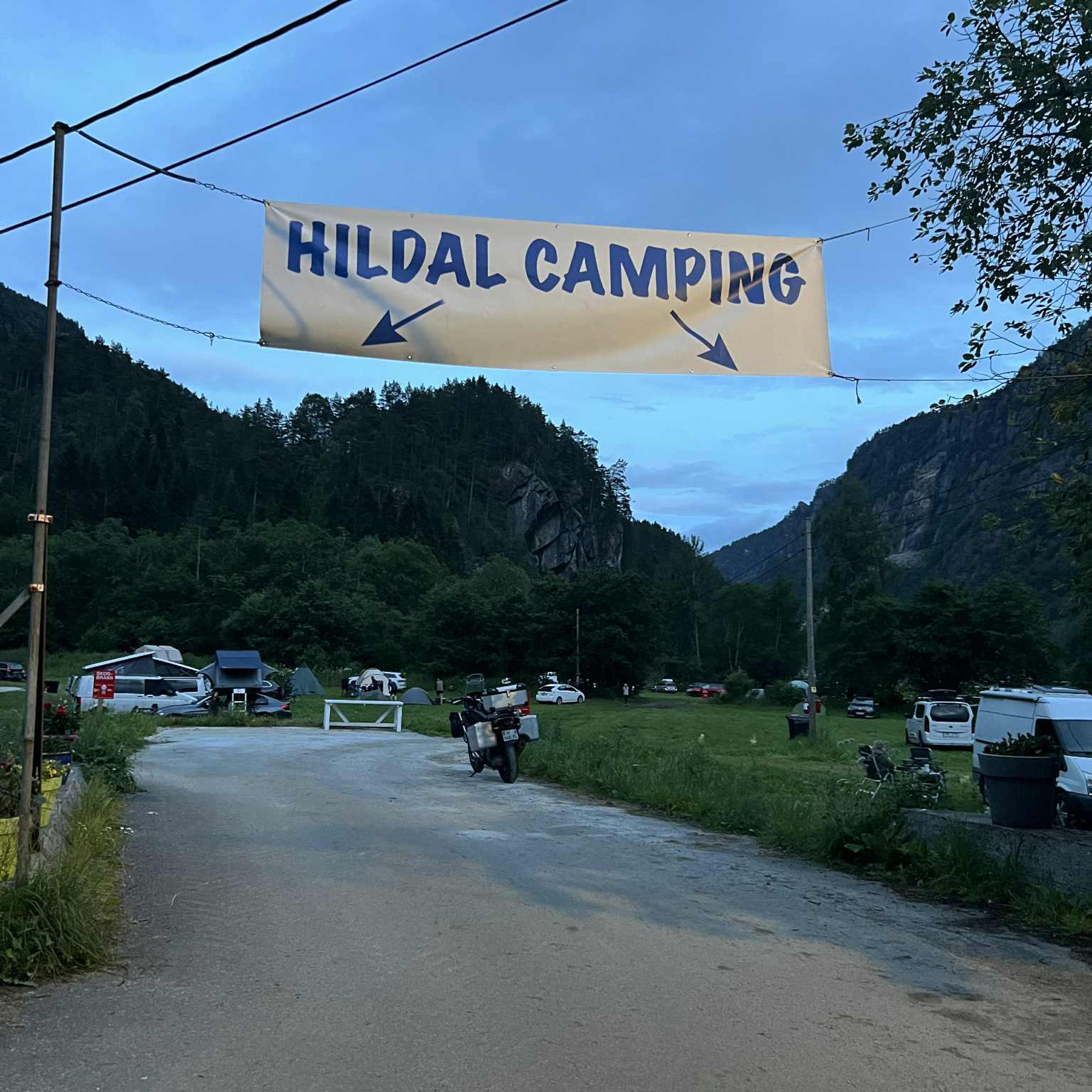 Entrance to Hildal Camping surrounded by mountains and green valleys in Hardanger.