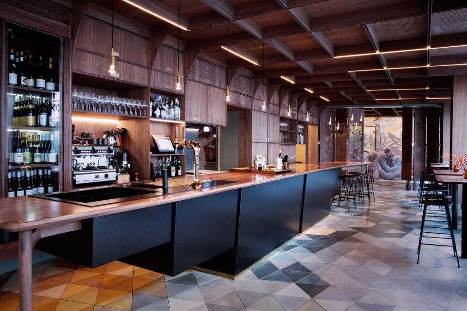 Interior photo of the dark, wooden bar.
