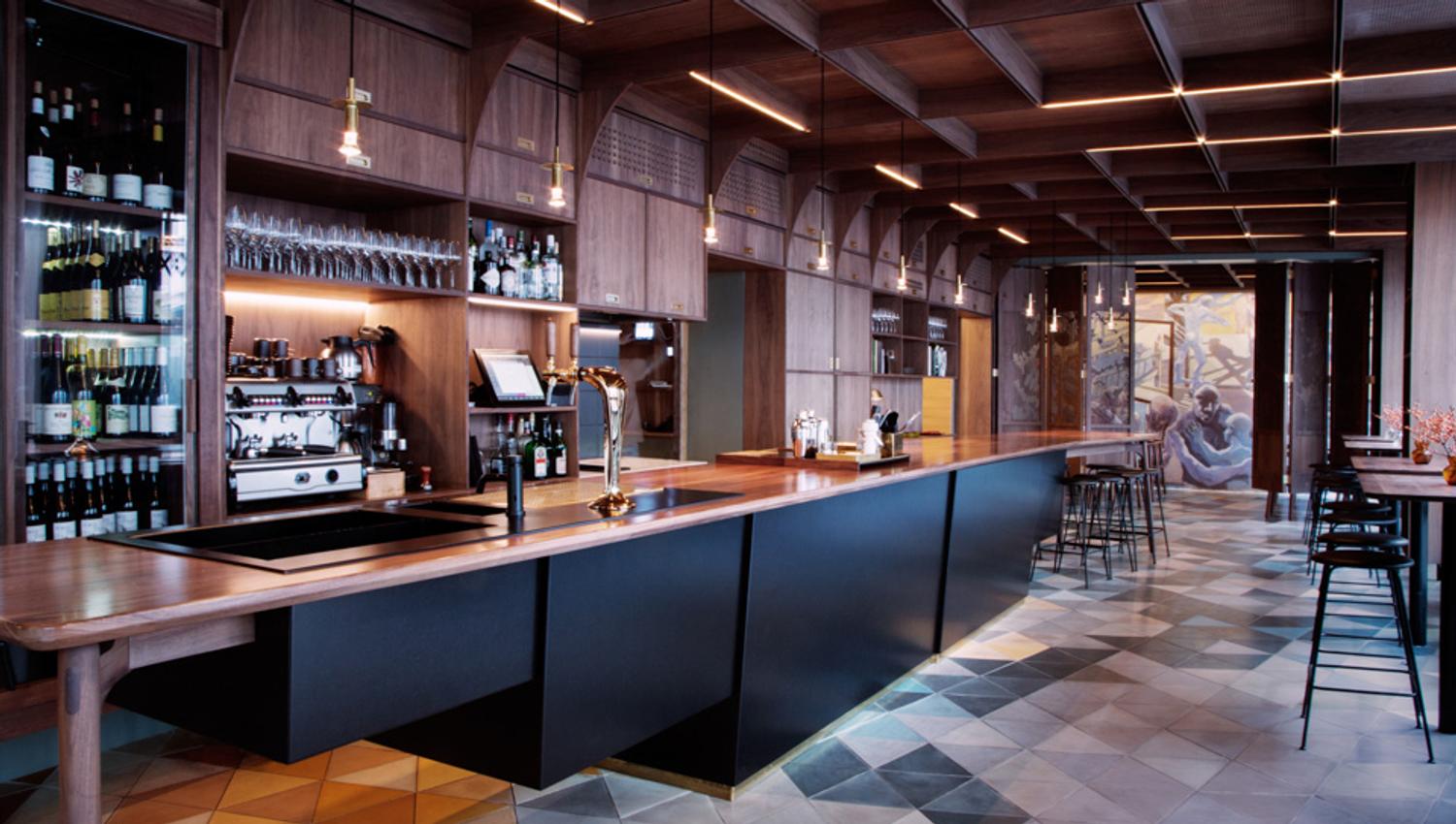 Interior photo of the dark, wooden bar.